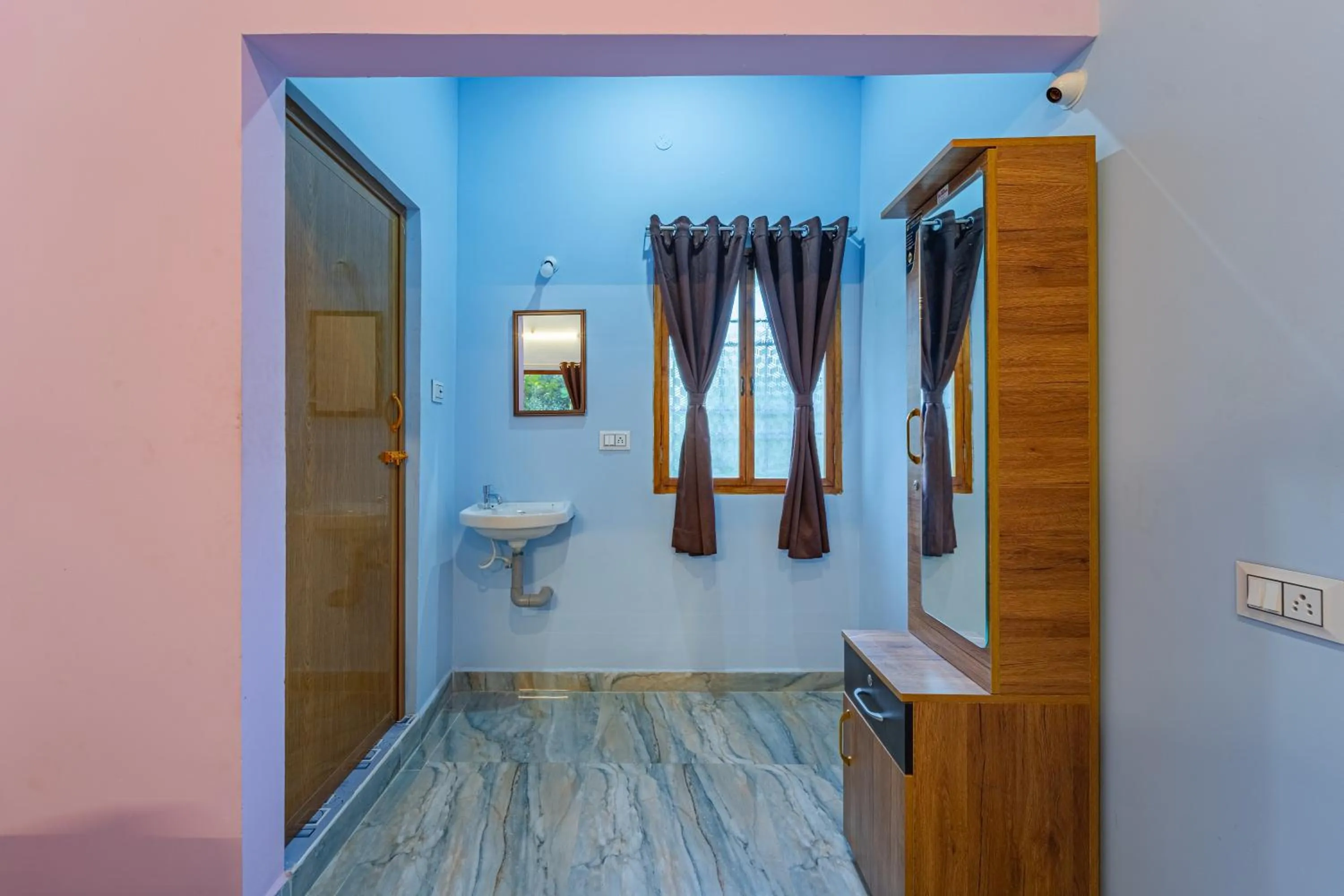Toilet in Hotel De Jardin Pondicherry with Swimming Pool