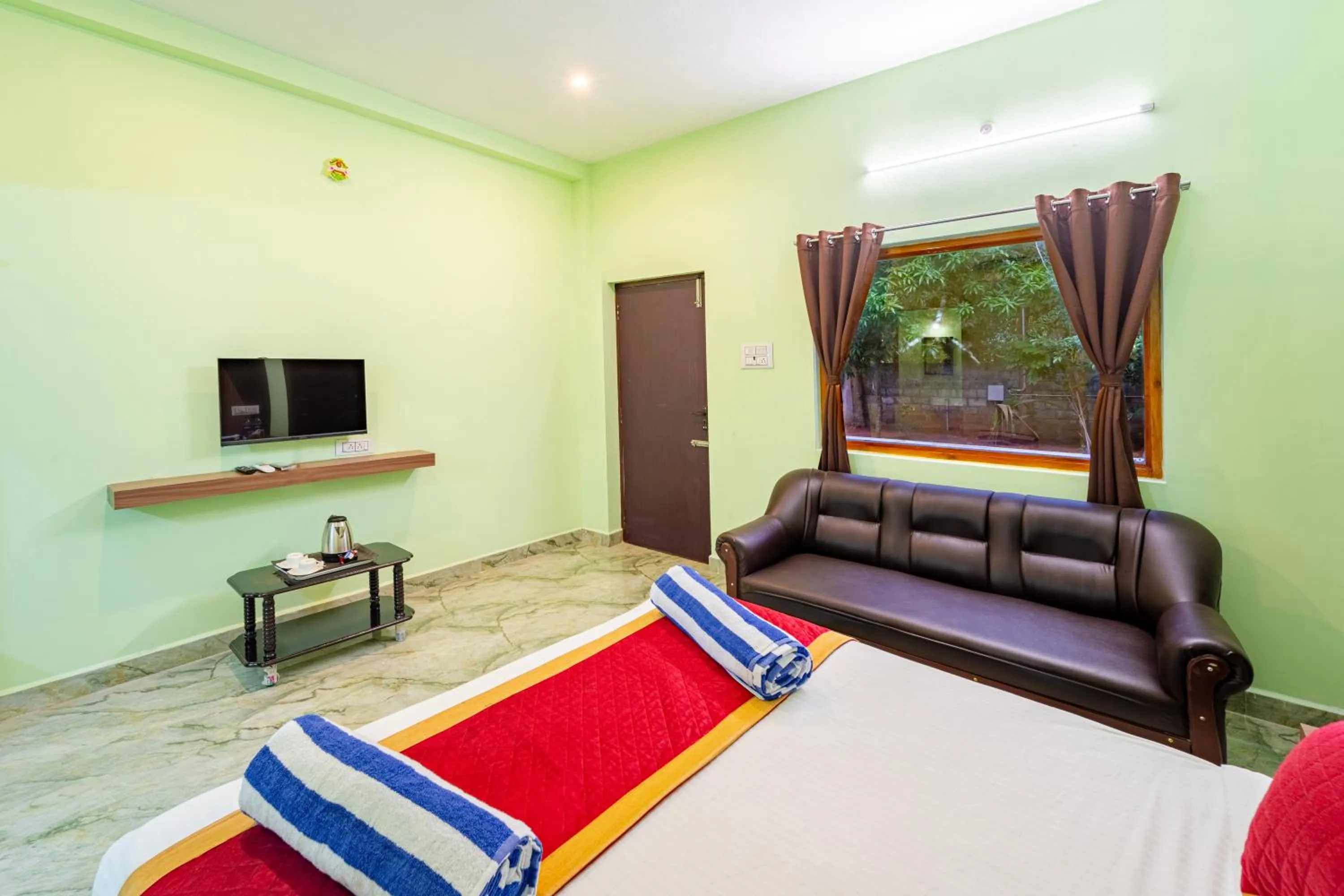 Bedroom, Bed in Hotel De Jardin Pondicherry with Swimming Pool