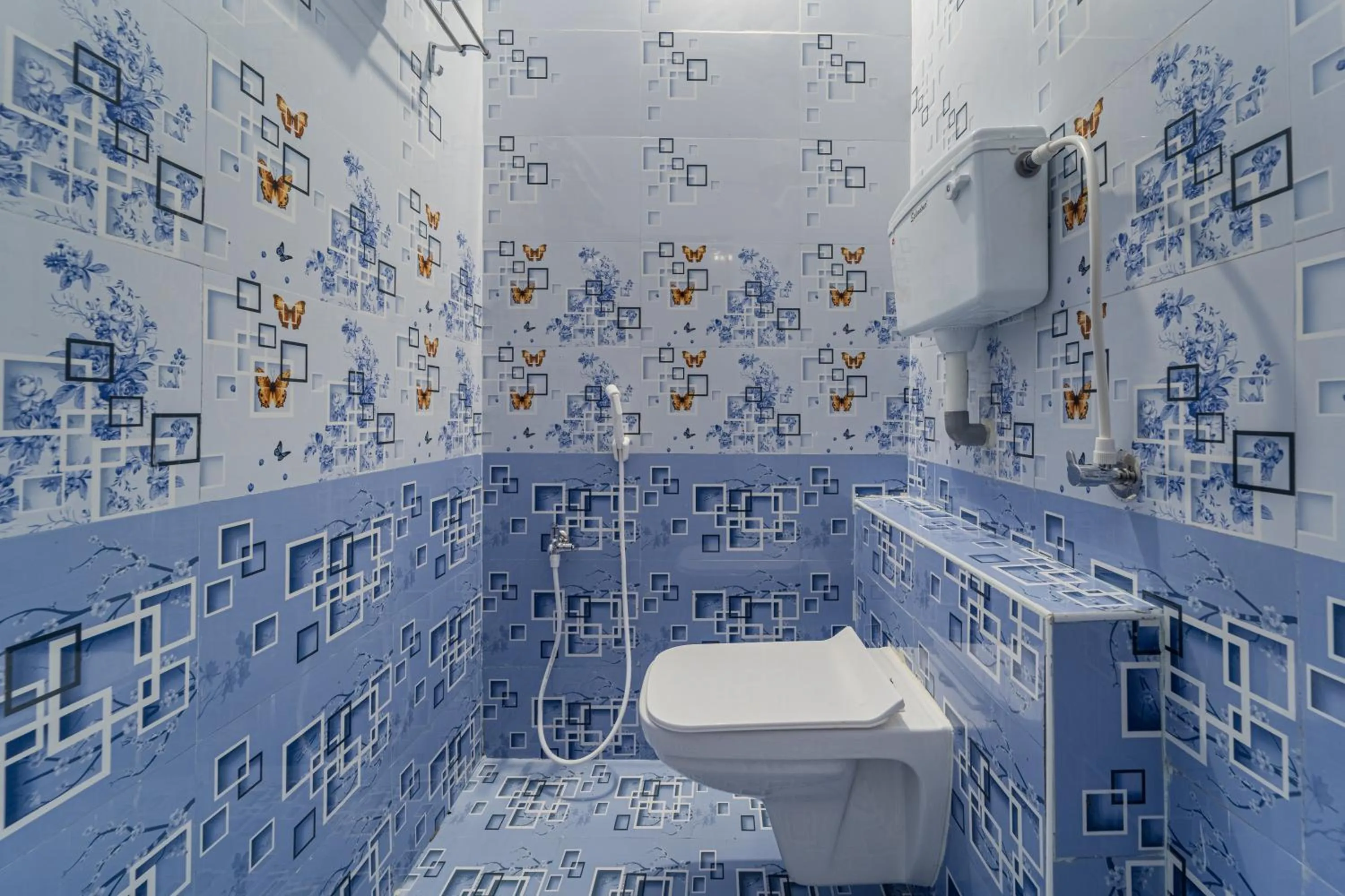 Shower in Hotel De Jardin Pondicherry with Swimming Pool