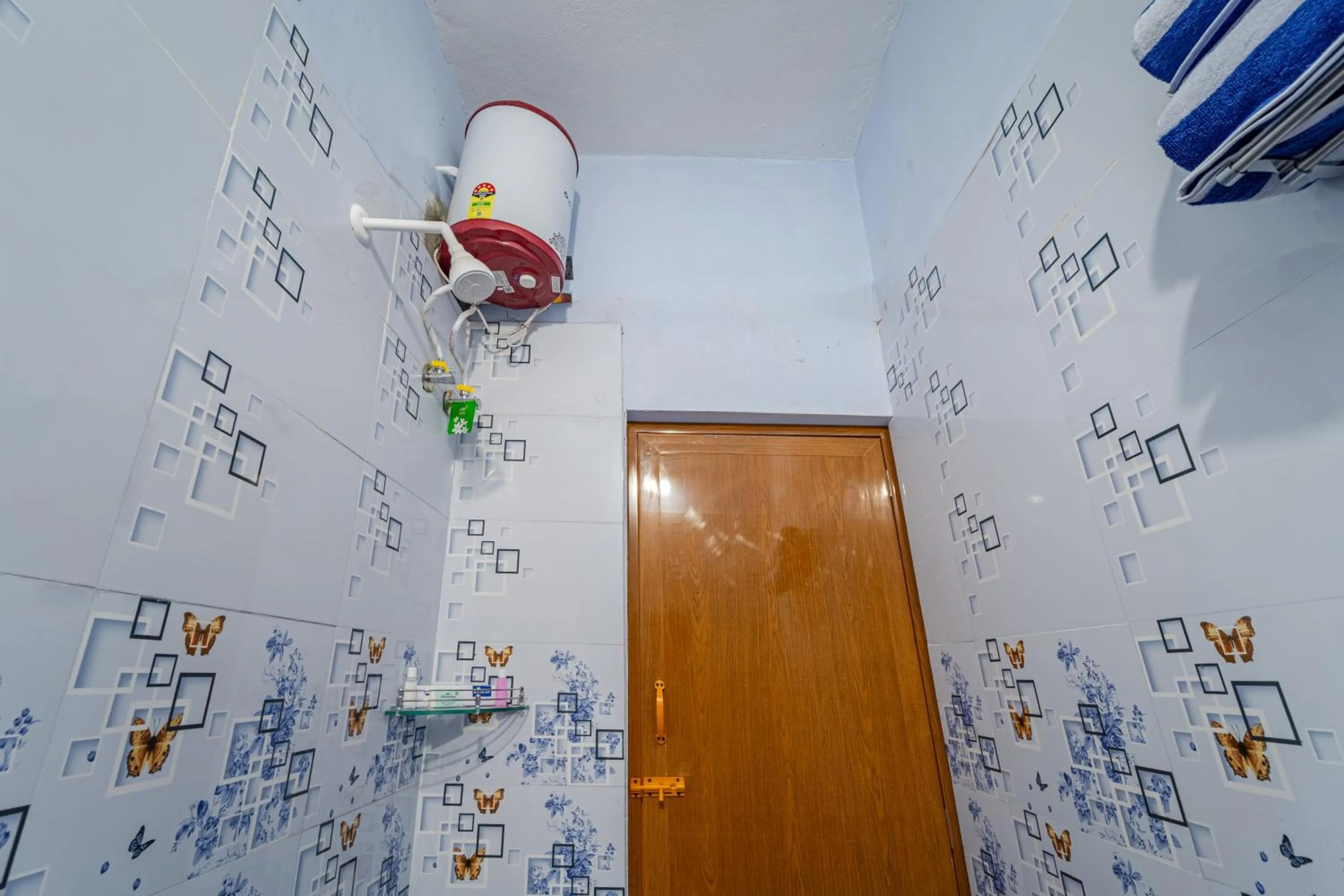 Toilet in Hotel De Jardin Pondicherry with Swimming Pool