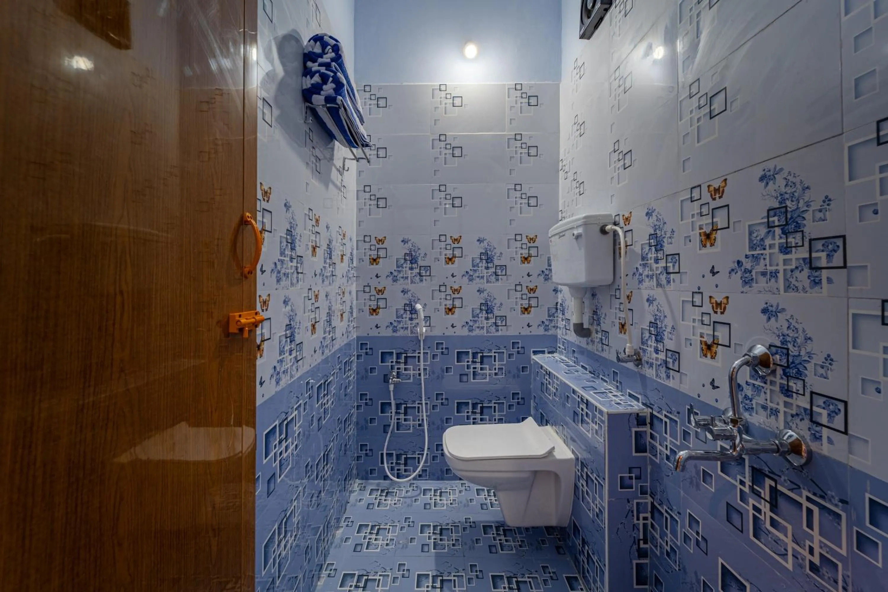 Shower in Hotel De Jardin Pondicherry with Swimming Pool