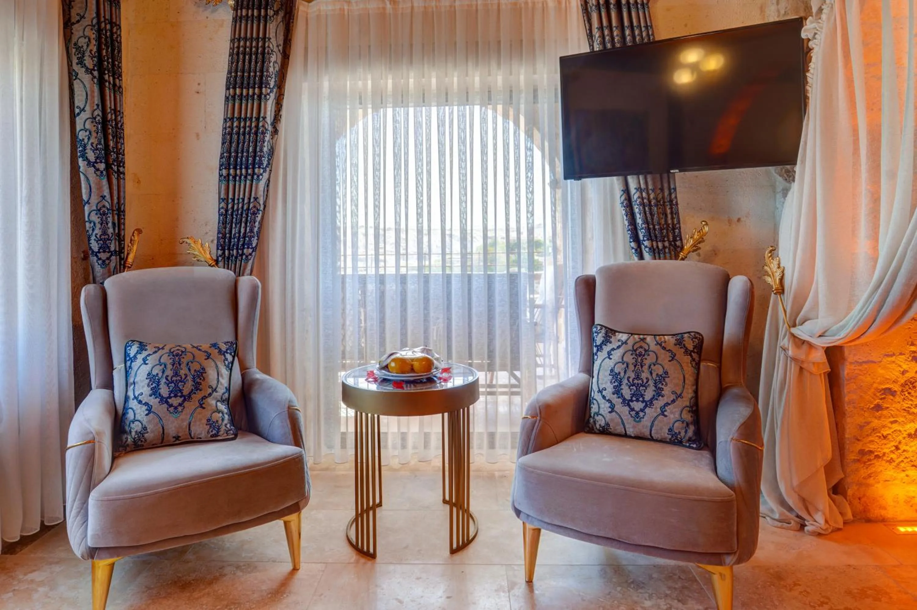 Seating area in Kasr-ı Kapadokya Cave Suites