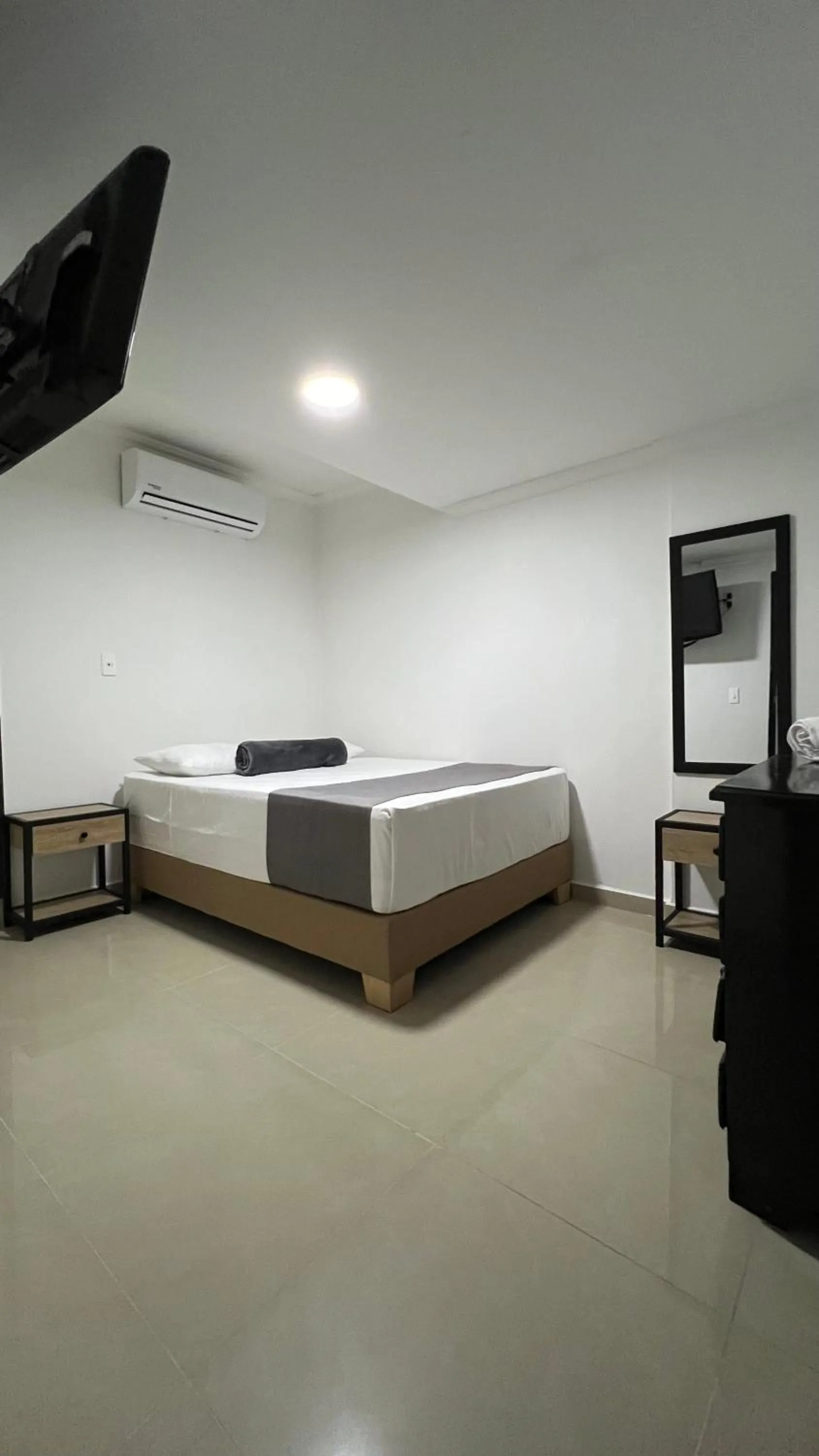 Communal lounge/ TV room, Bed in Hotel Medellín 66