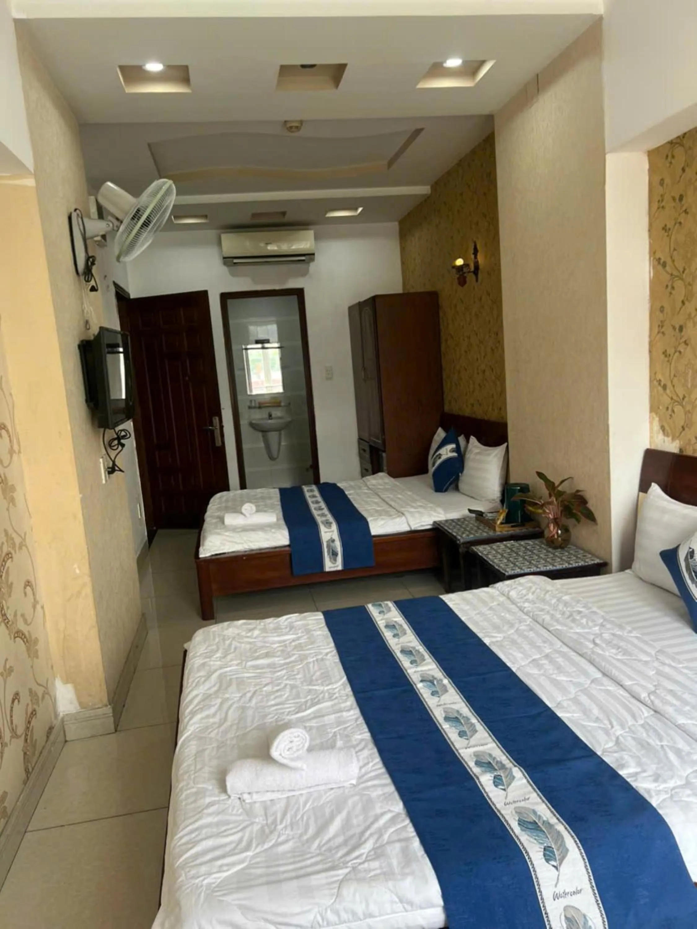 Bed in Quang Huy Hotel