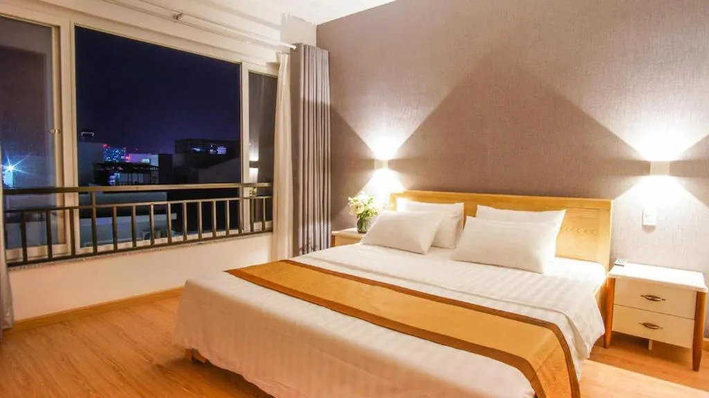 Bed in ARTMIO Hotel Apartment