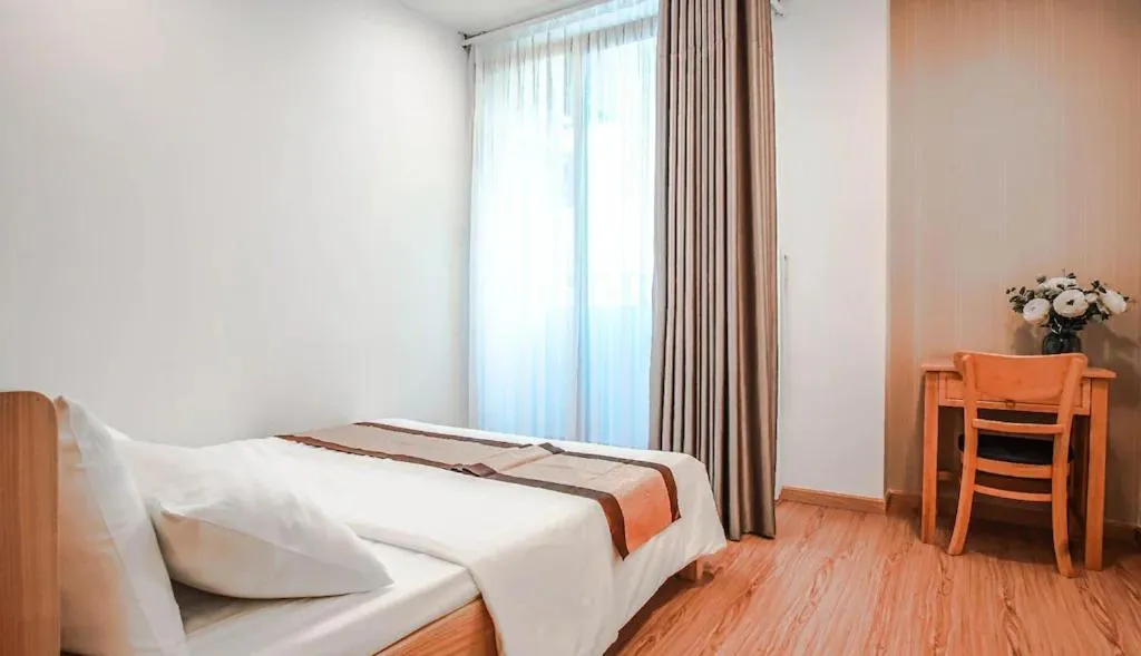 Bed in ARTMIO Hotel Apartment