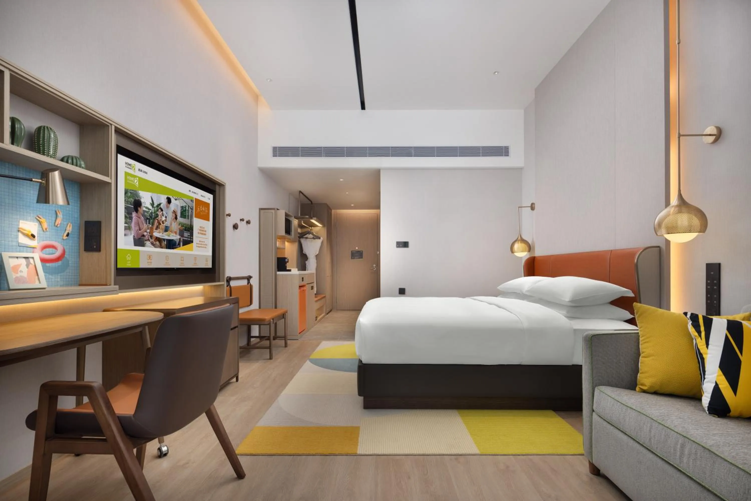 Seating area, Bed in Home2 Suites by Hilton Guangzhou Huangpu Science City Free shuttle buses are provided during the Canton Fair