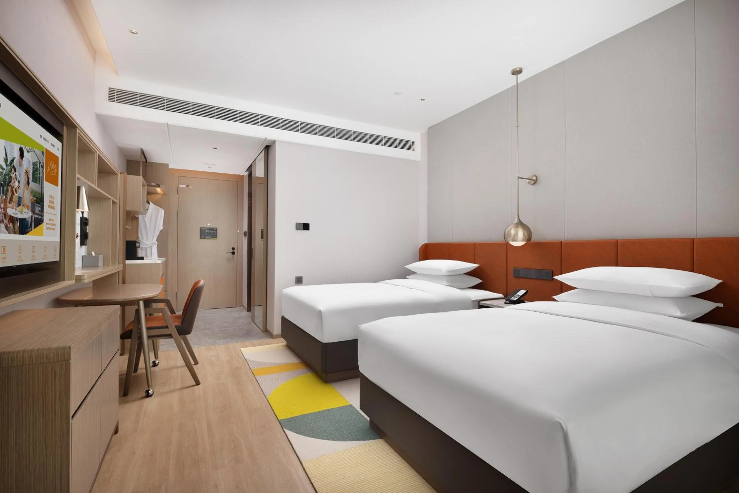 Bed in Home2 Suite by Hilton Jingdezhen Changnan