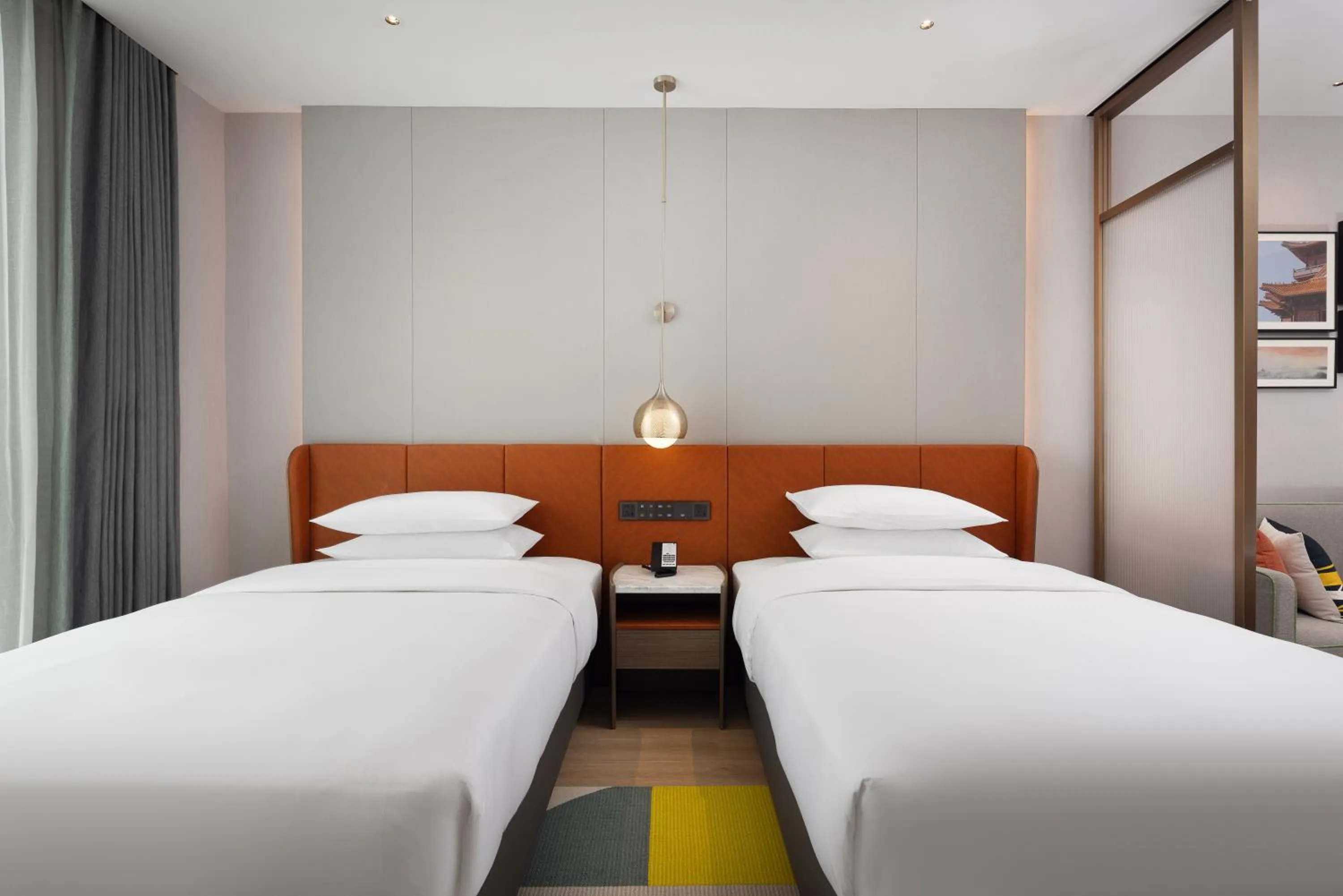 Bed in Home2 Suite by Hilton Jingdezhen Changnan
