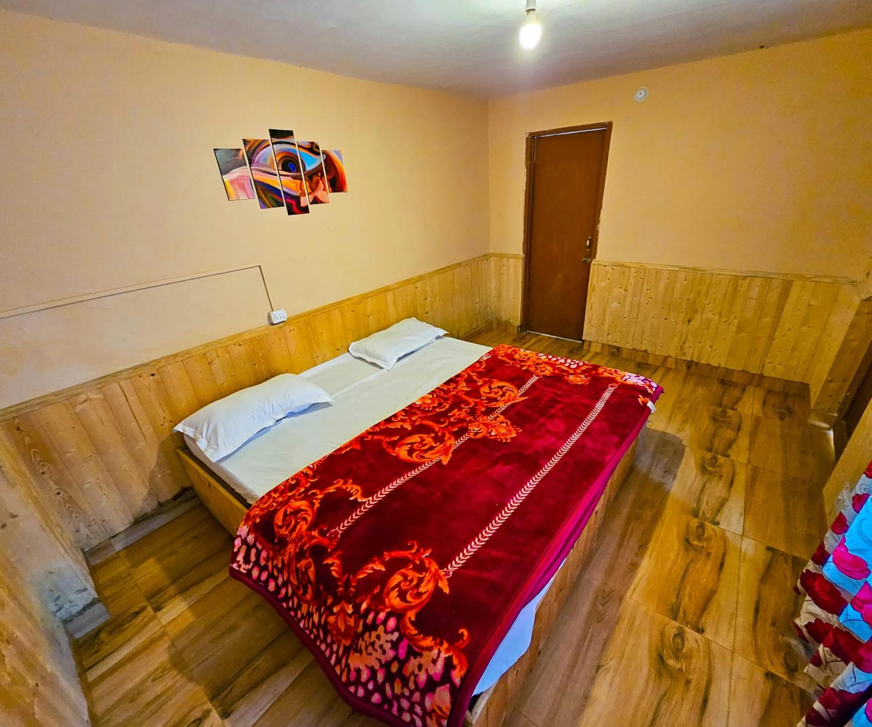 Bed in PREMALYA TRAILS By Tirtha