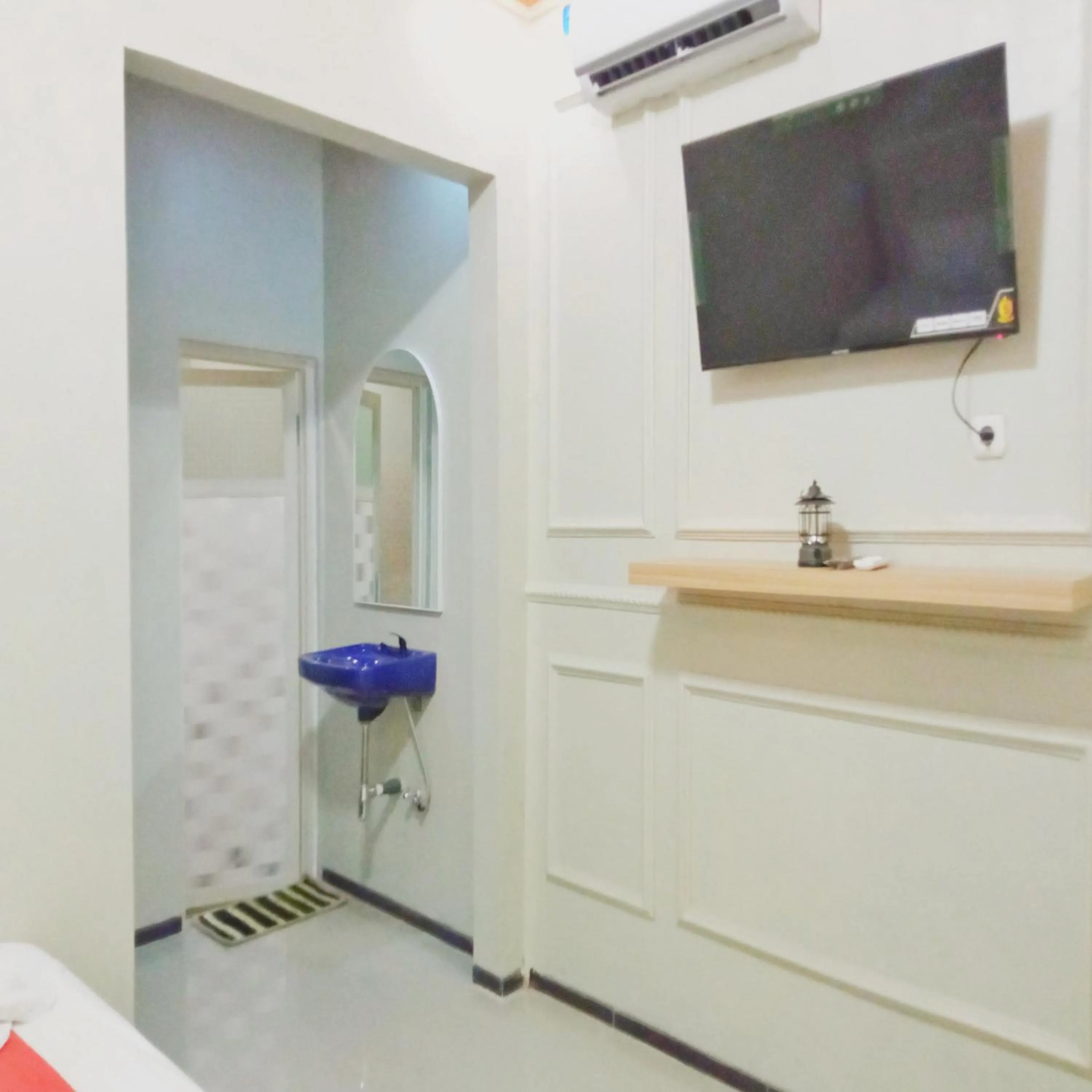 TV and multimedia in Rifal Inn Mitra RedDoorz