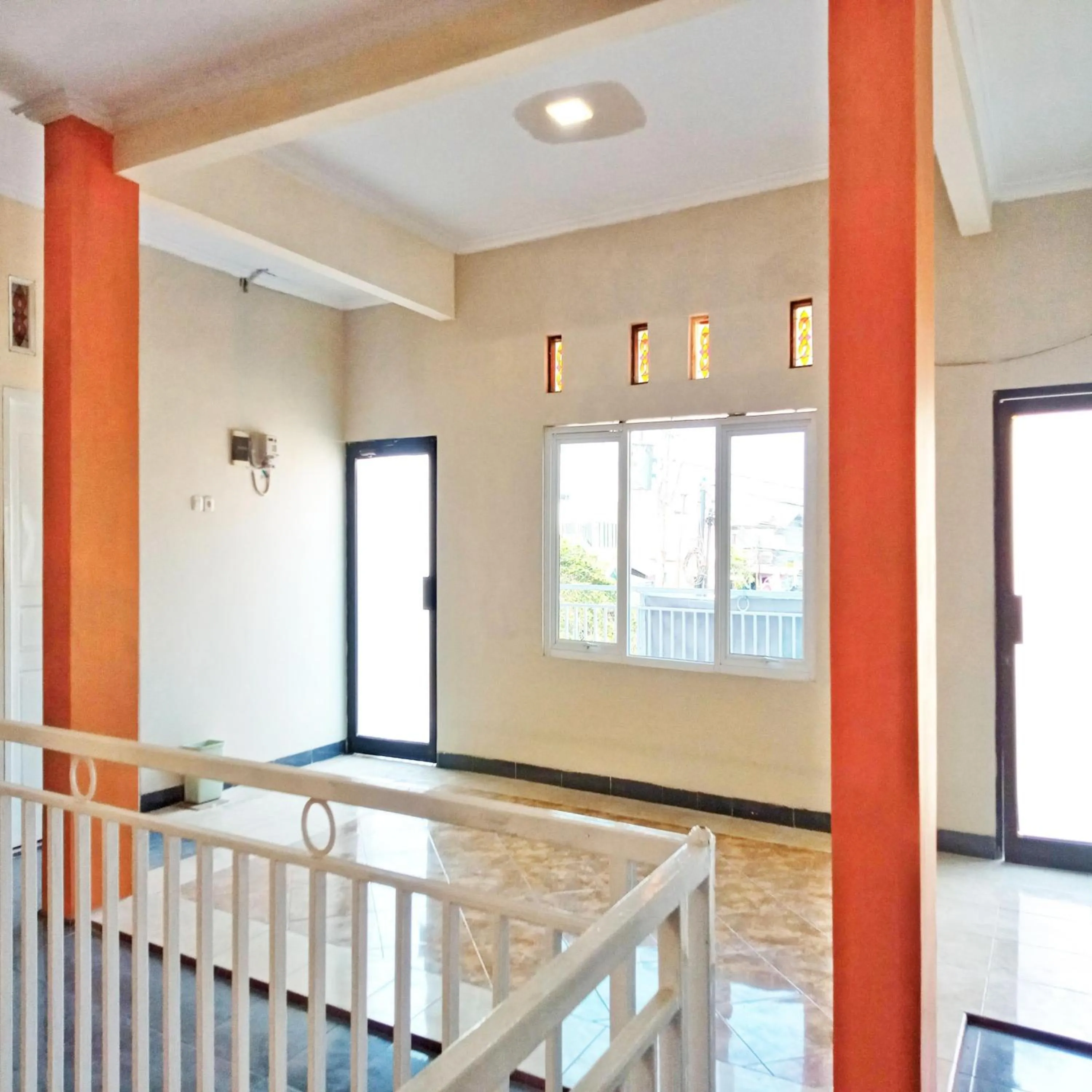 Property building in Rifal Inn Mitra RedDoorz