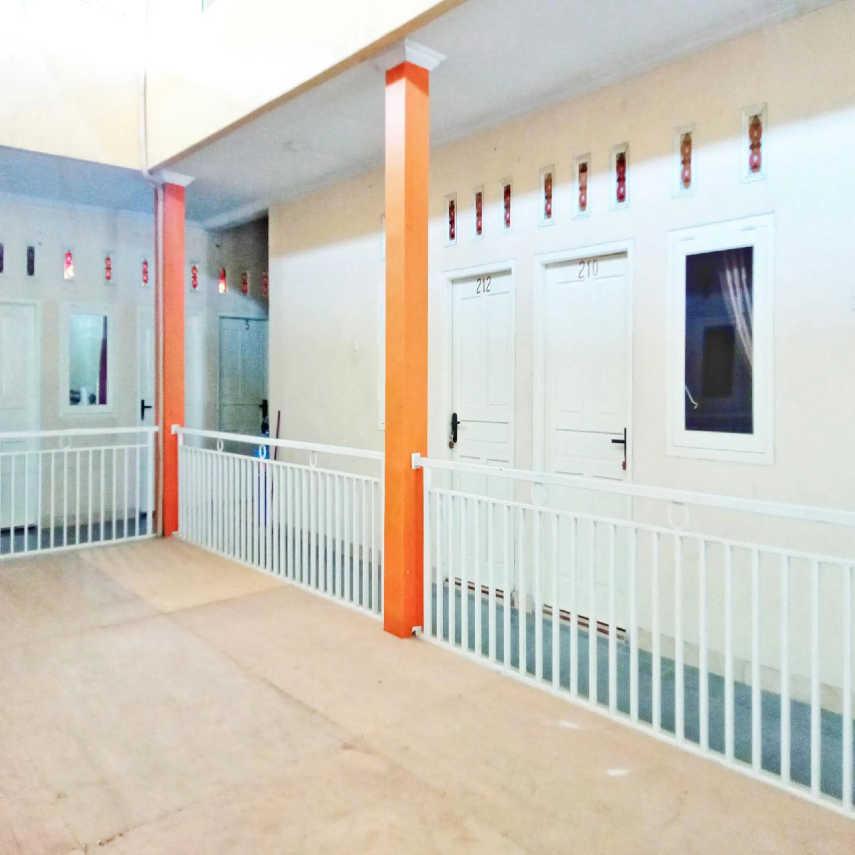 Property building in Rifal Inn Mitra RedDoorz