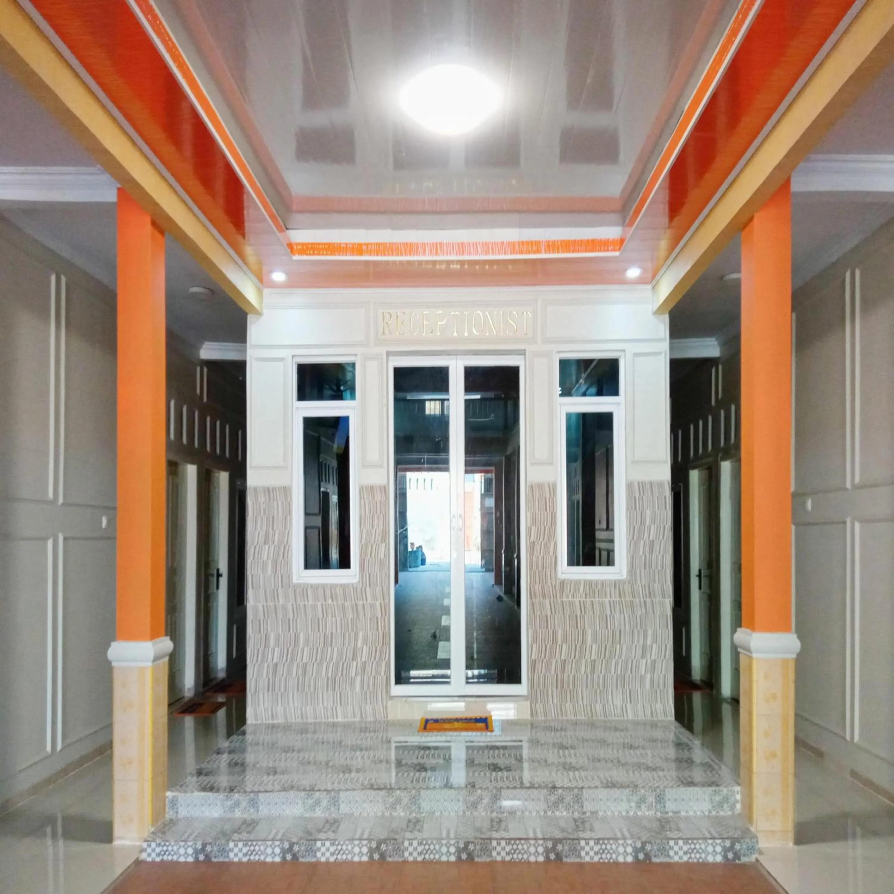 Property building in Rifal Inn Mitra RedDoorz