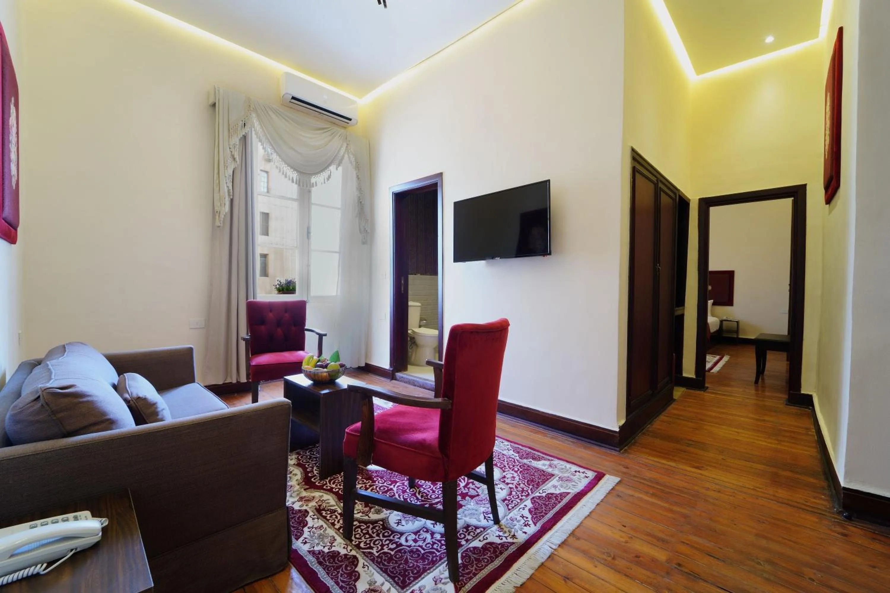 Communal lounge/ TV room in Victoria Cairo Hotel