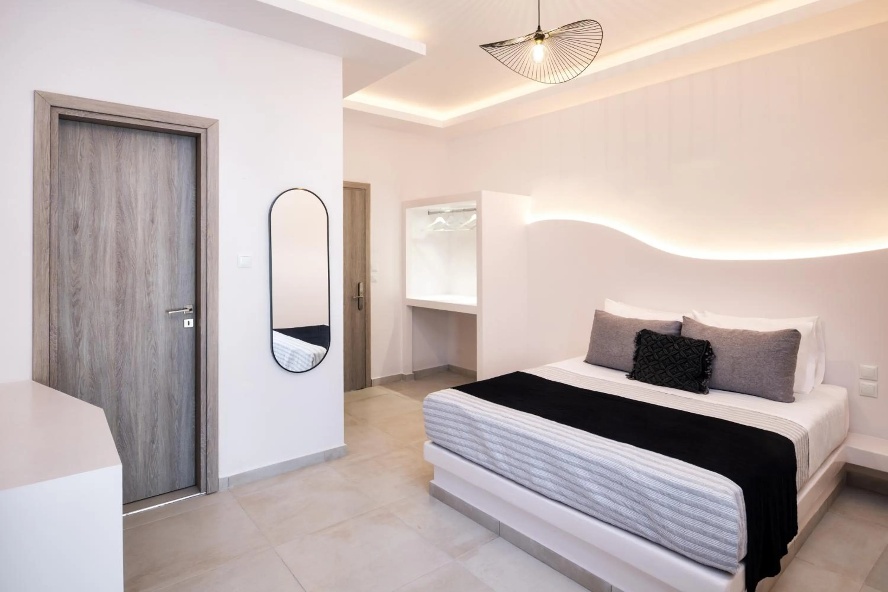 Bed in Santorinn Suites Fira