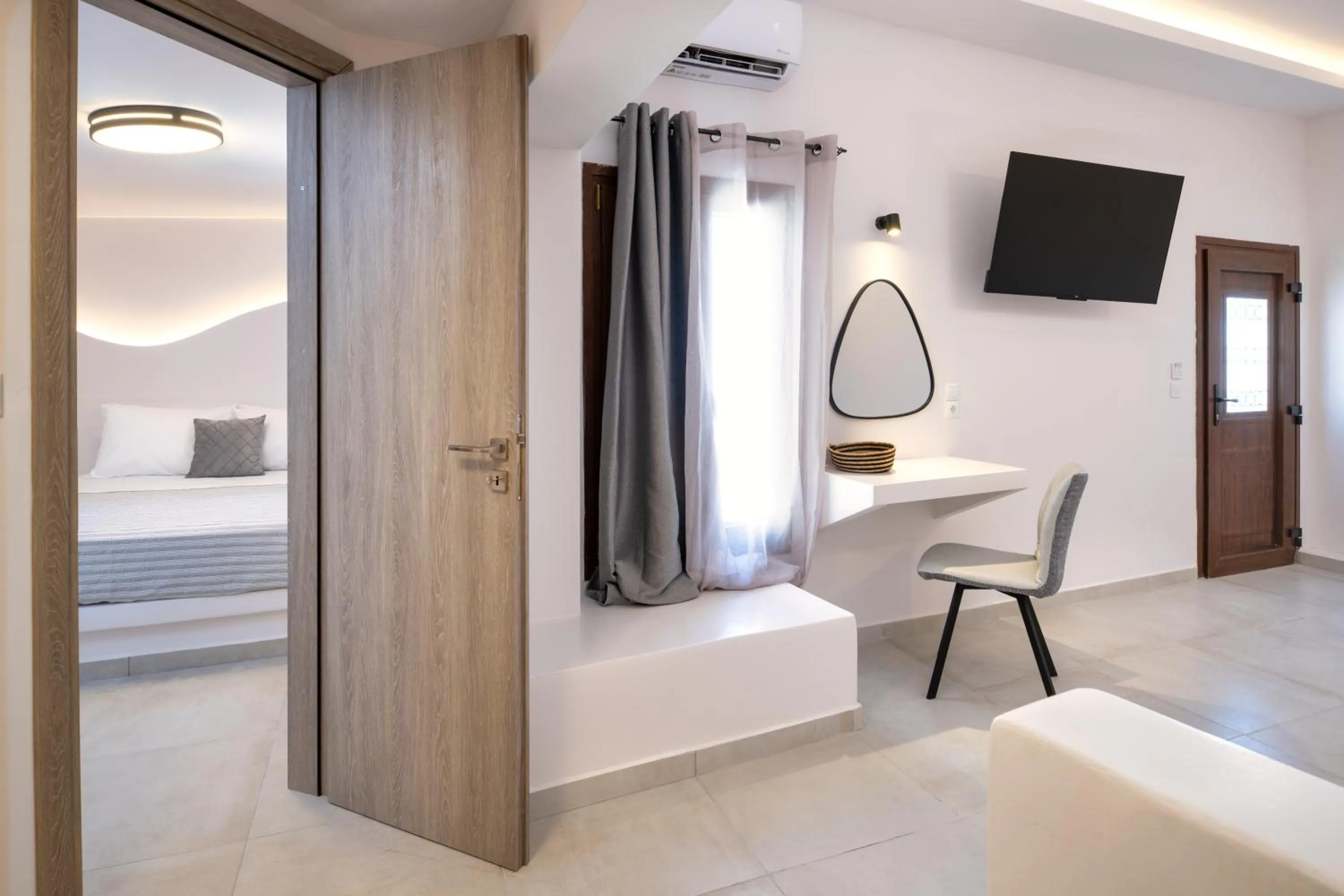 Bed in Santorinn Suites Fira