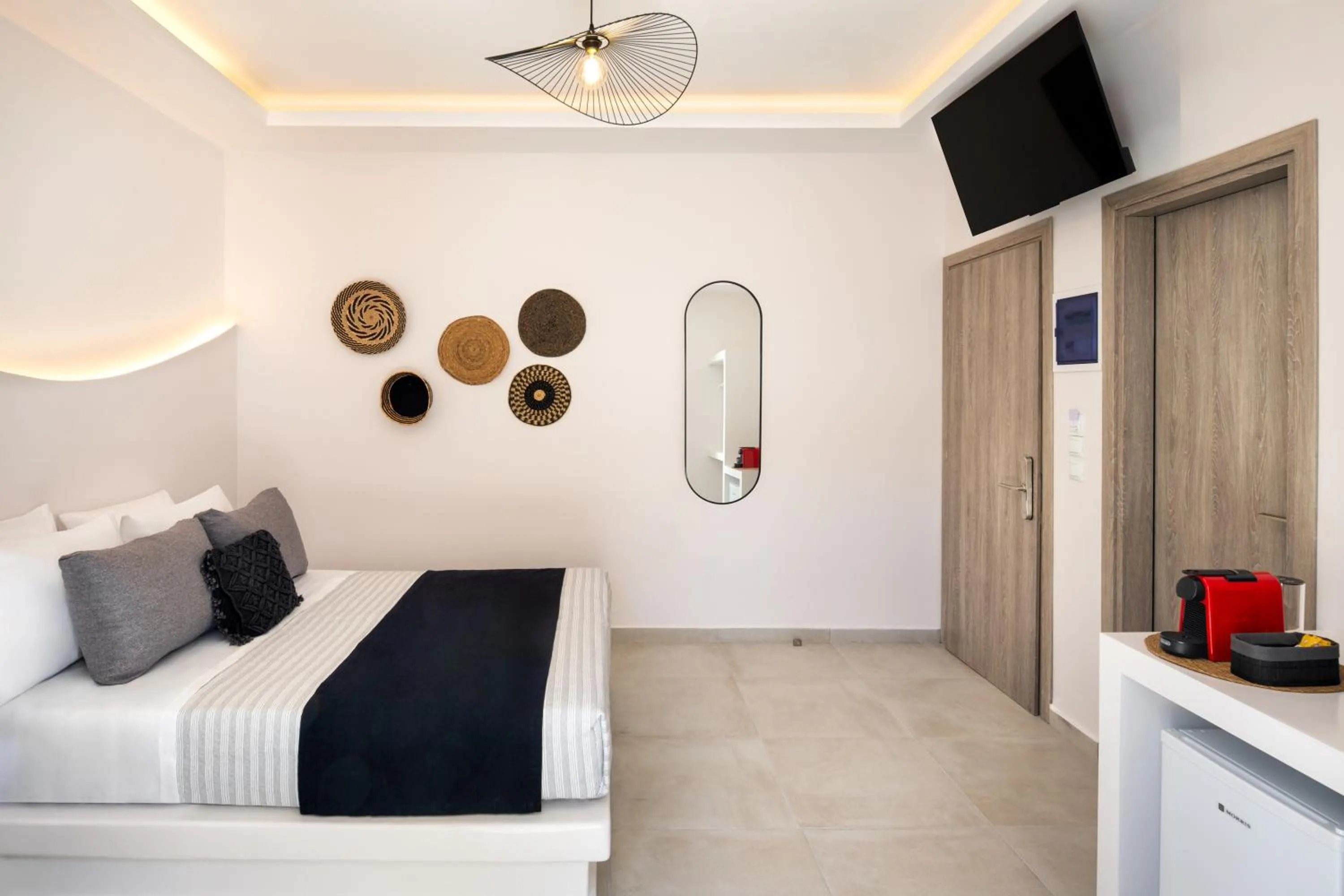 Bed in Santorinn Suites Fira