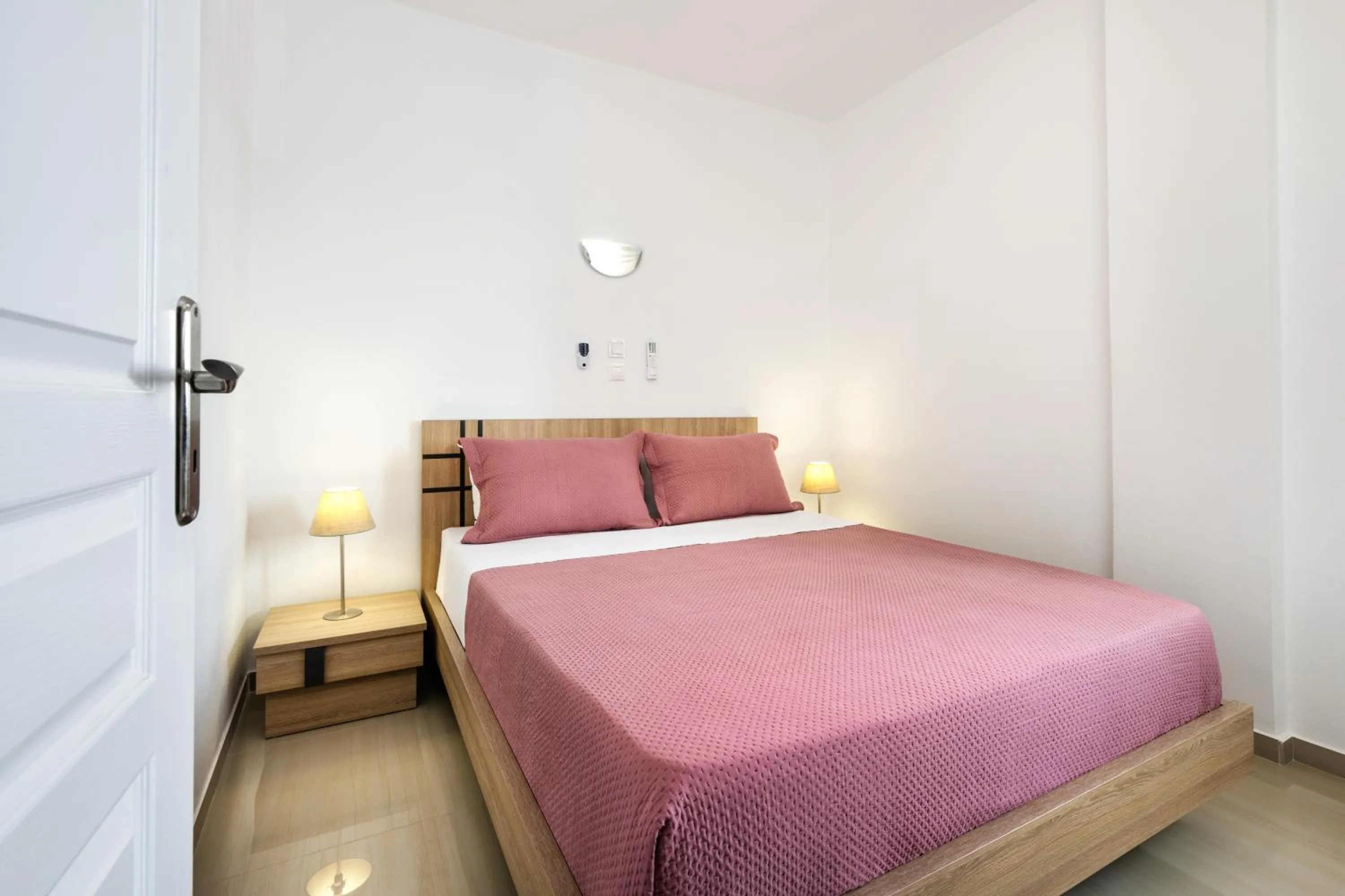 Bed in Santorinn Suites Fira
