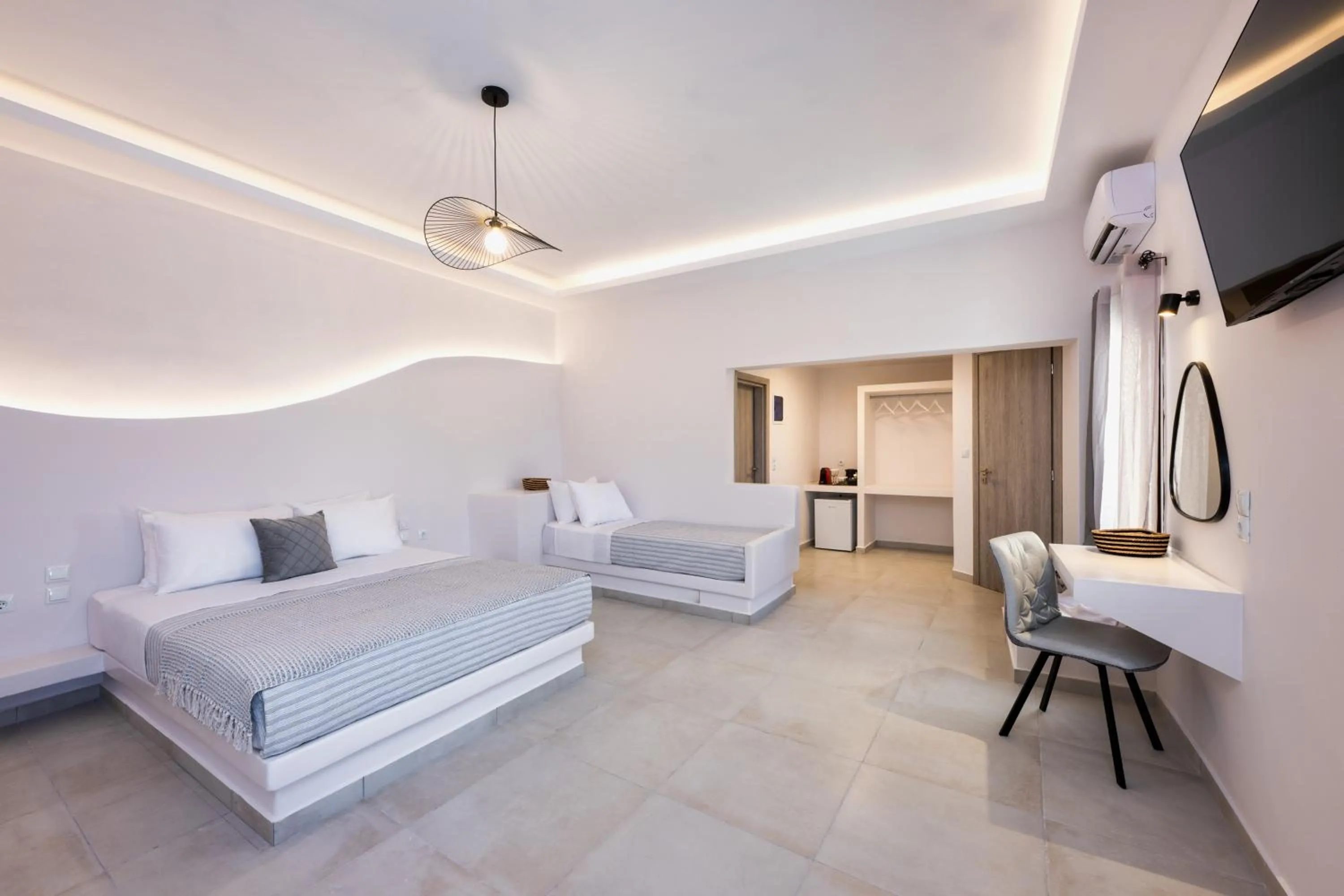 Bed in Santorinn Suites Fira