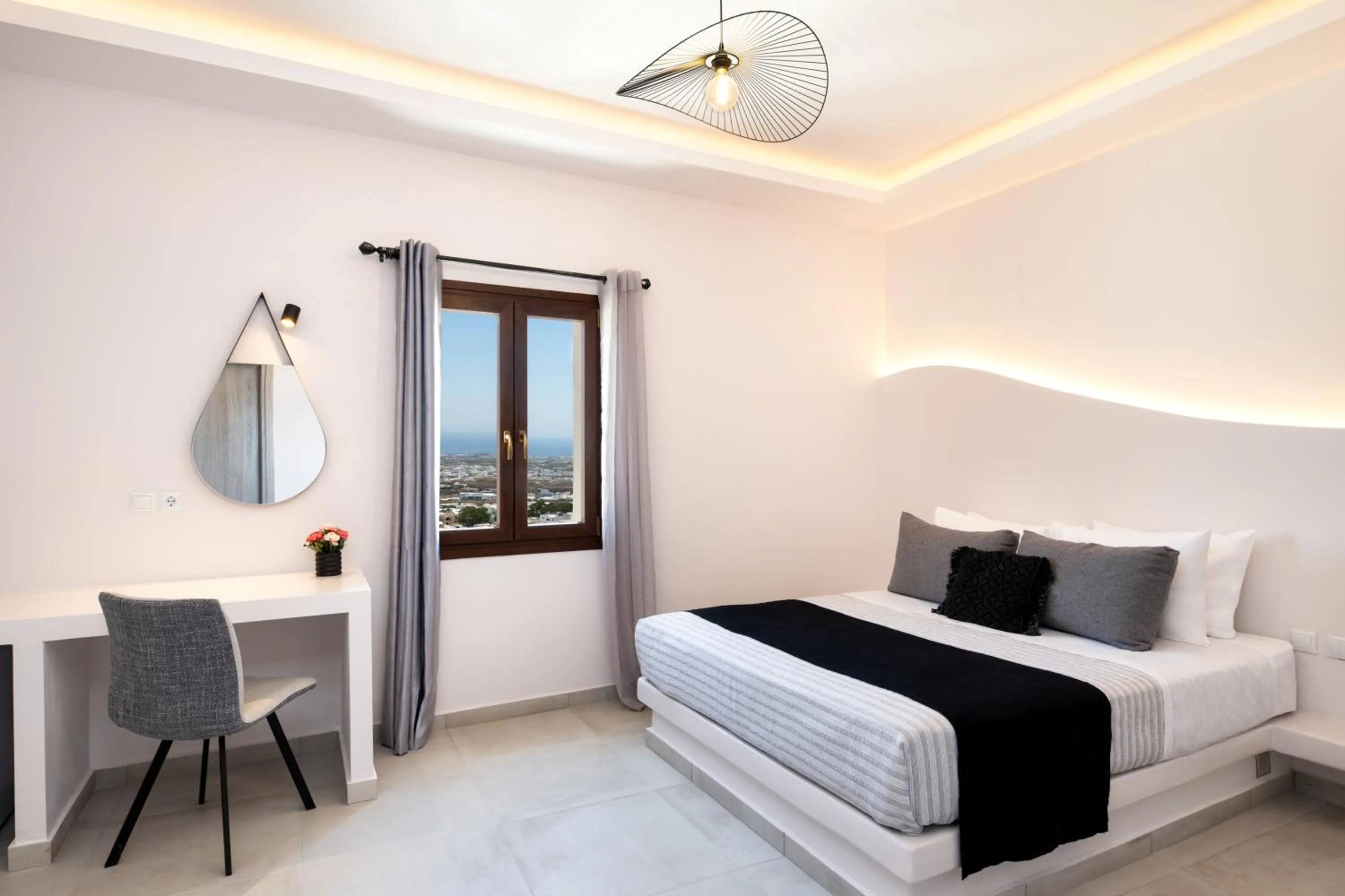 Bed in Santorinn Suites Fira