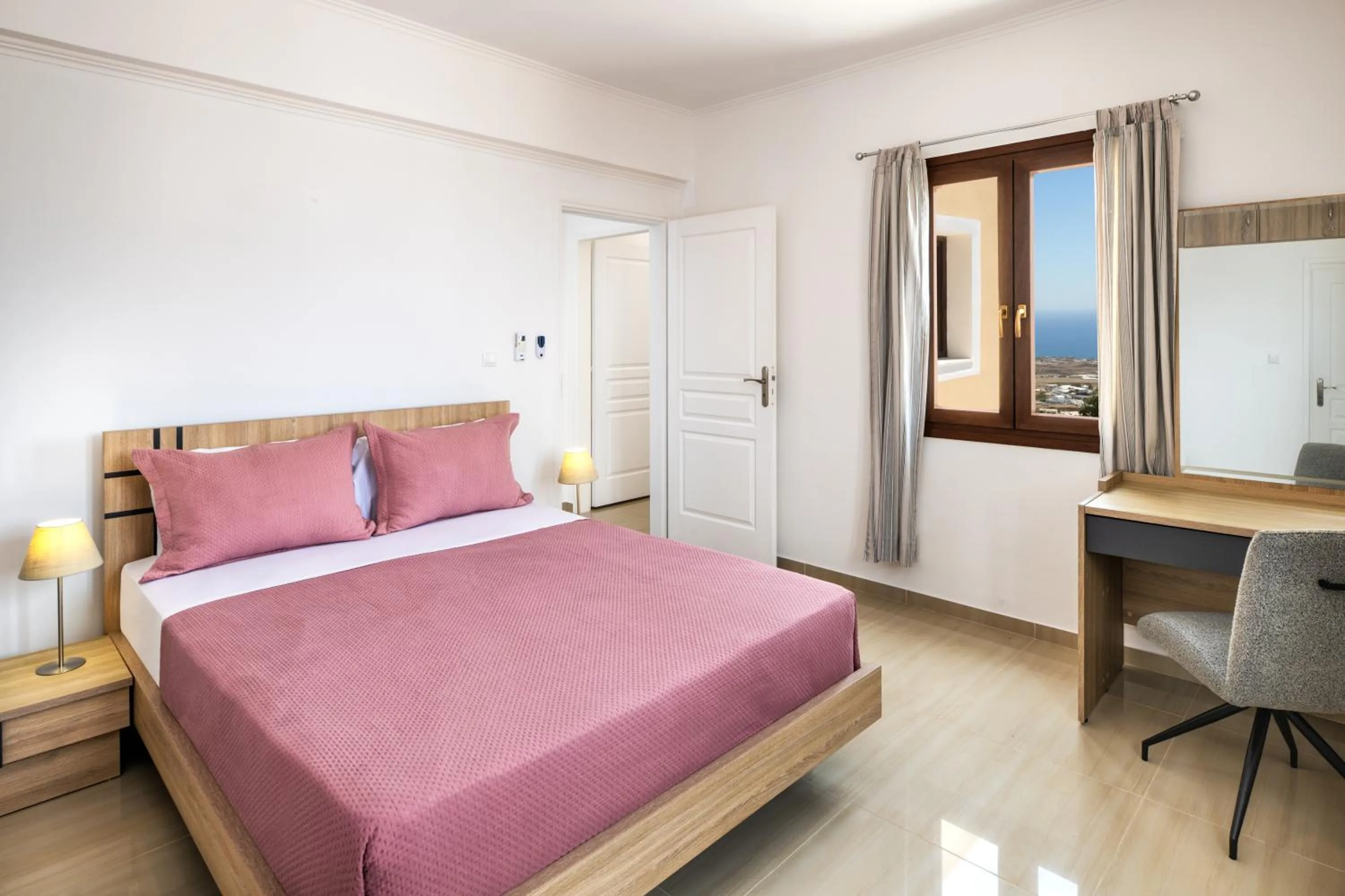 Bed in Santorinn Suites Fira