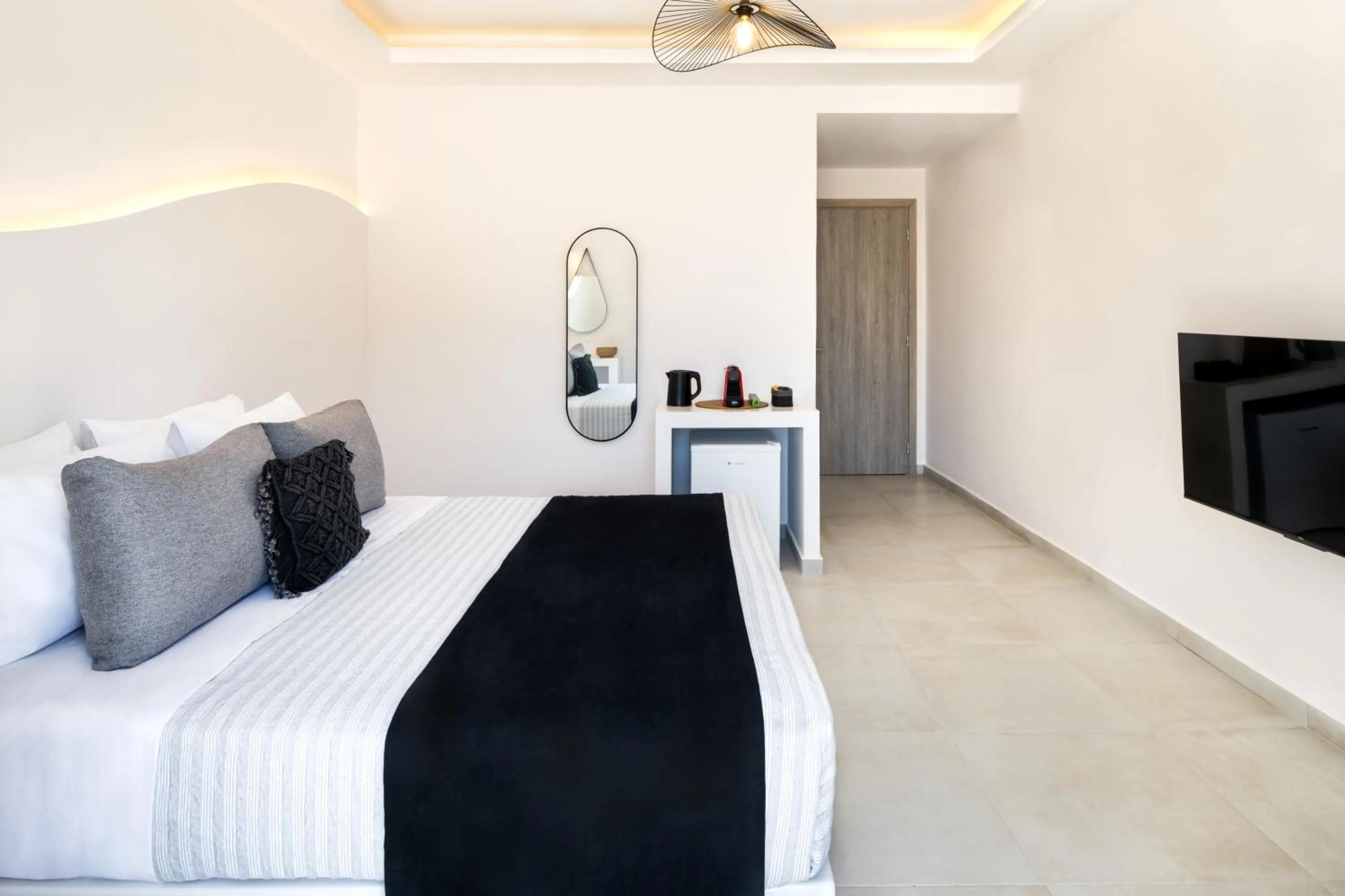 Bed in Santorinn Suites Fira