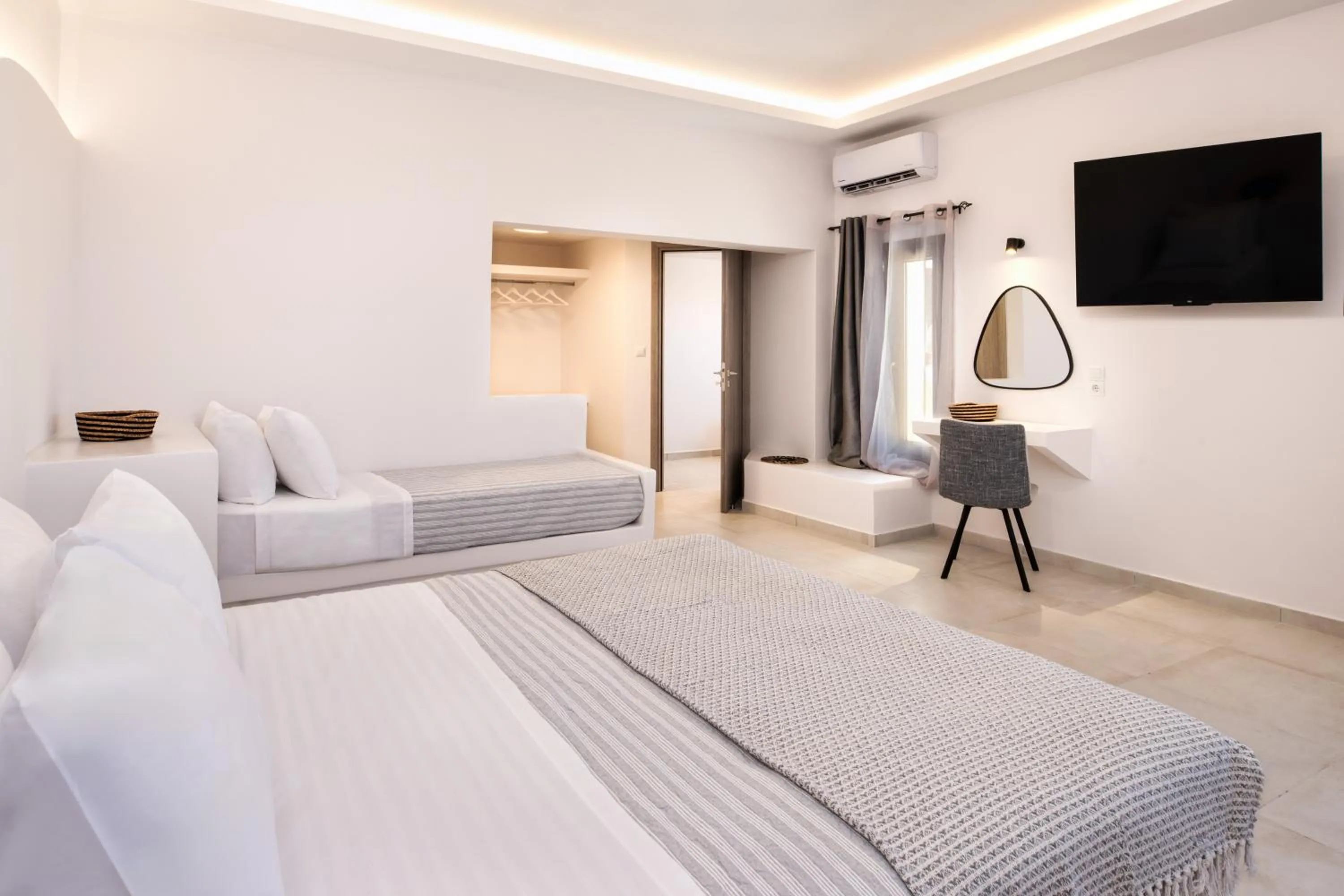 Bed in Santorinn Suites Fira