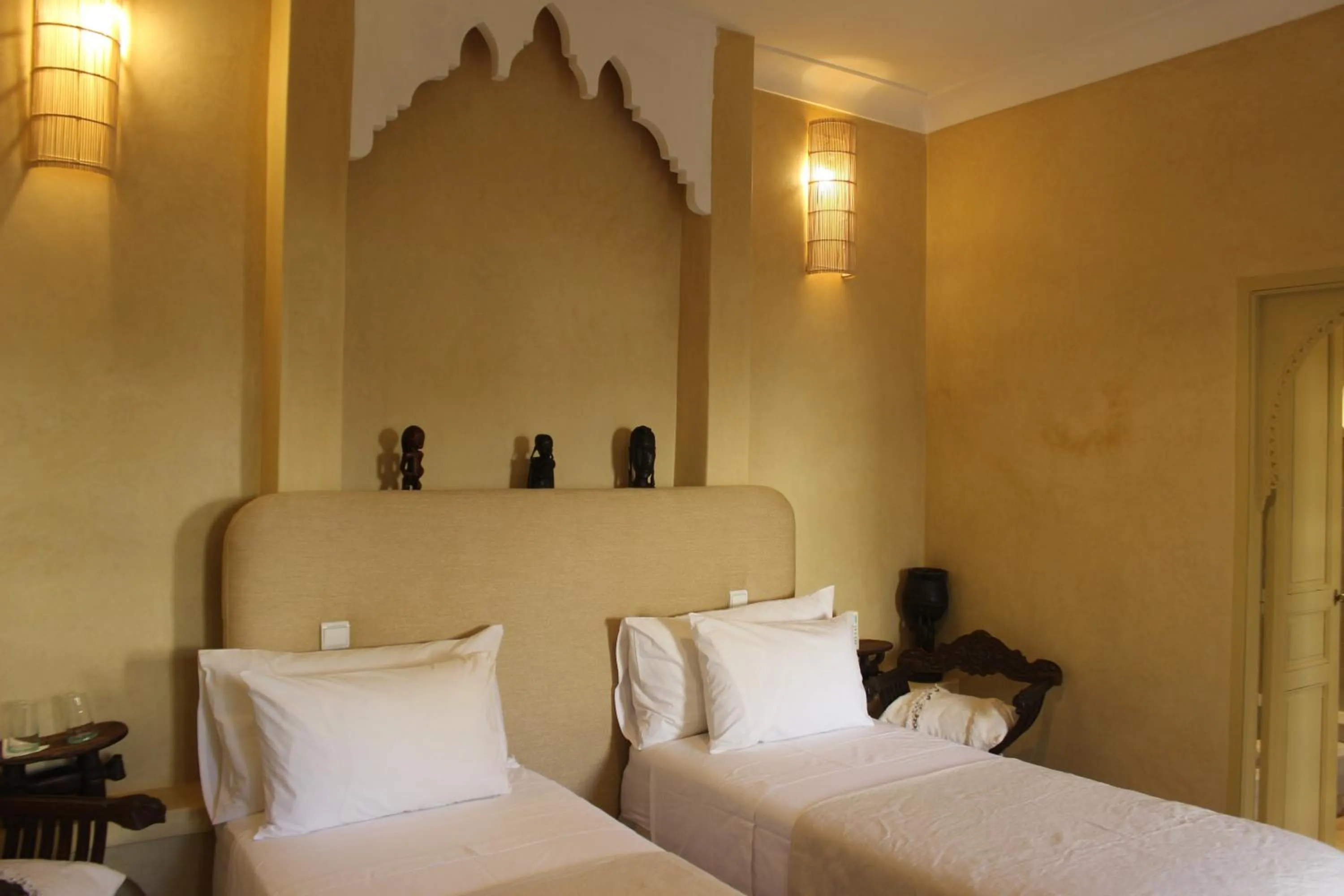 Bed in Riad Emberiza Sahari