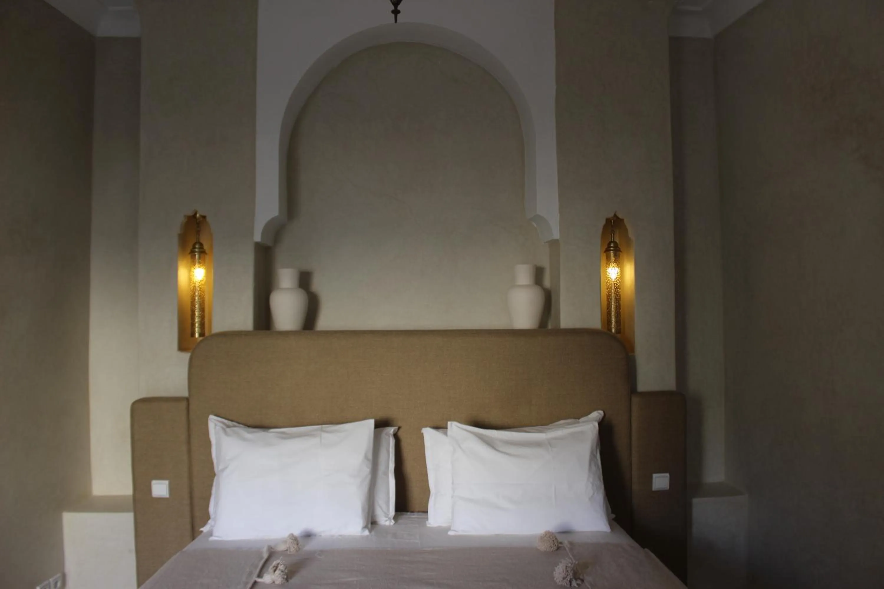 Bed in Riad Emberiza Sahari