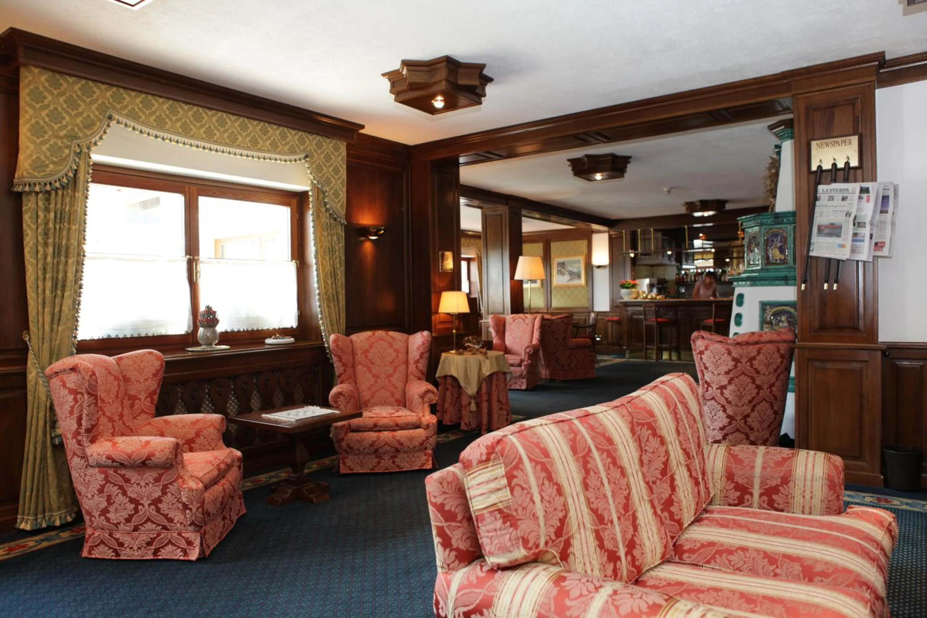 Communal lounge/ TV room in Hotel Petit Prince