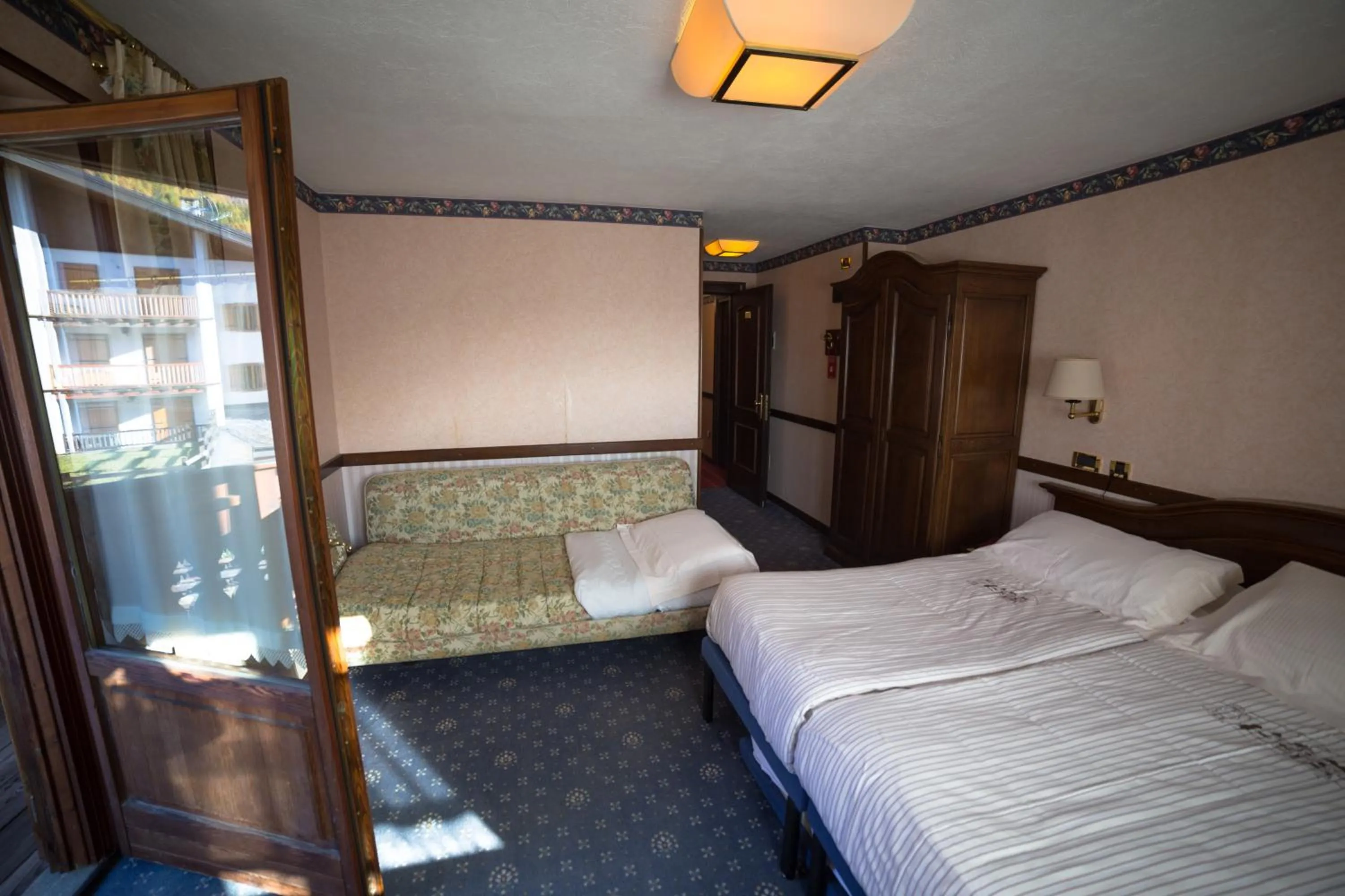 Photo of the whole room, Bed in Hotel Petit Prince