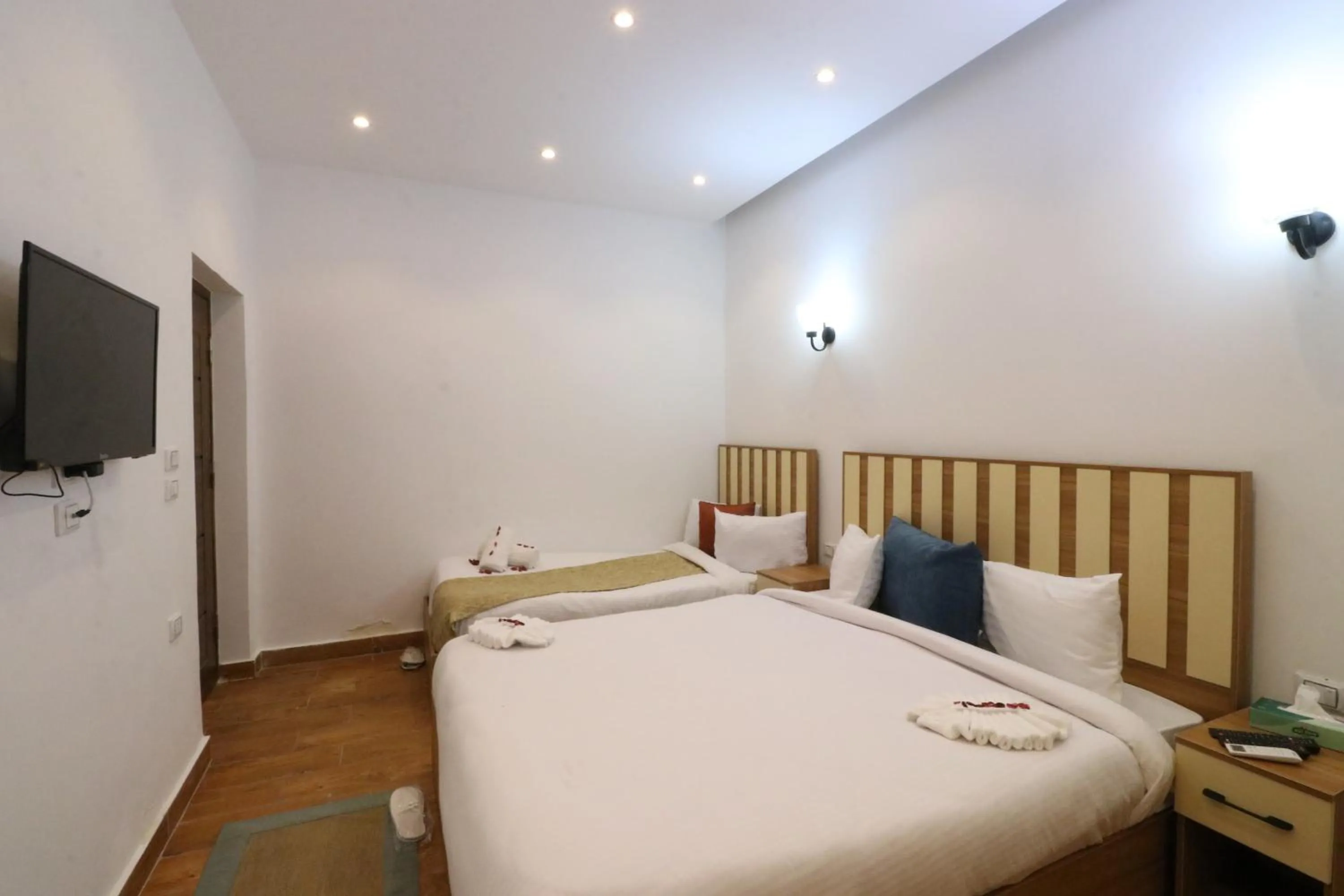 Bed in West Pyramids Hotel