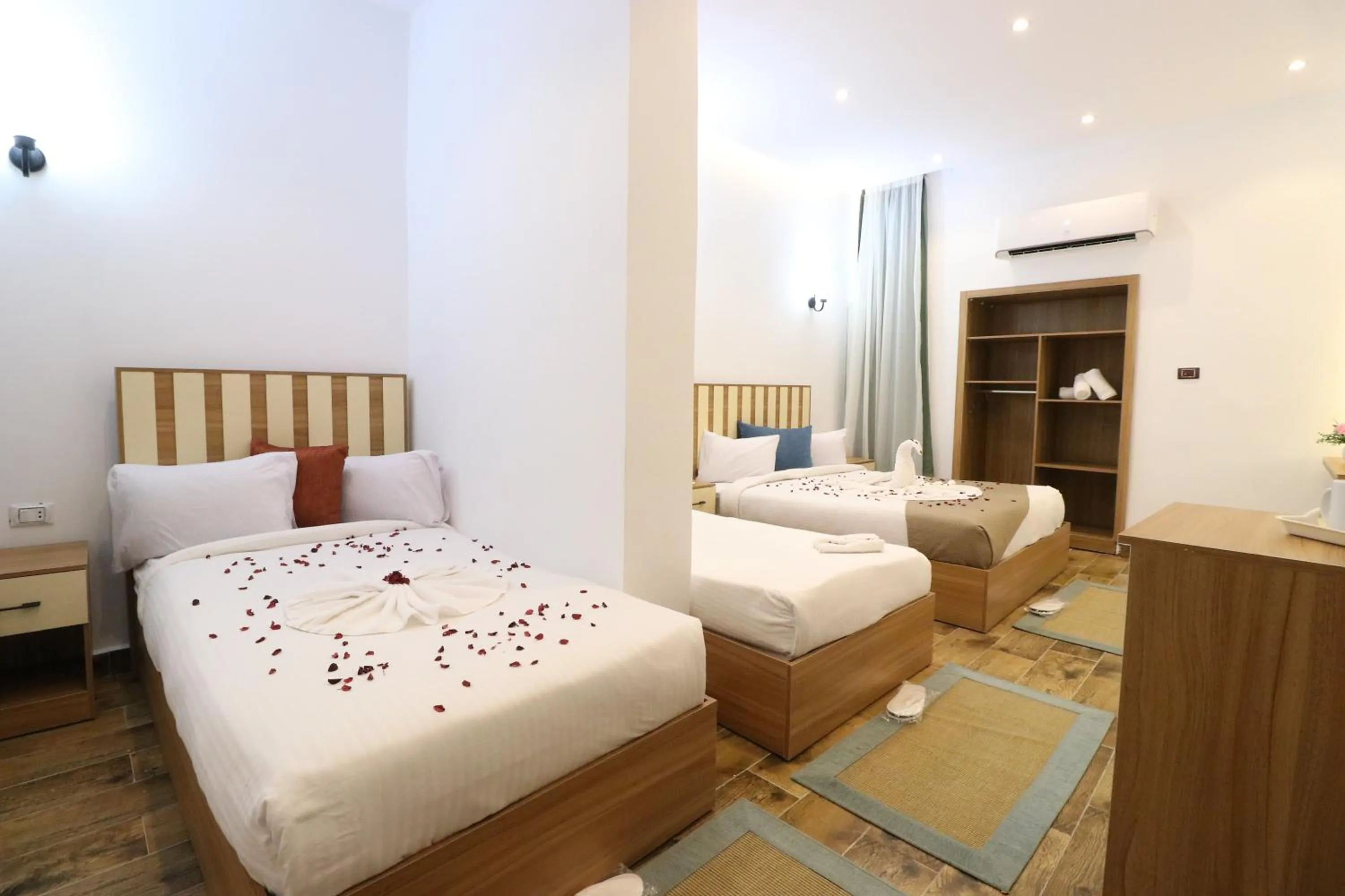 Bed in West Pyramids Hotel