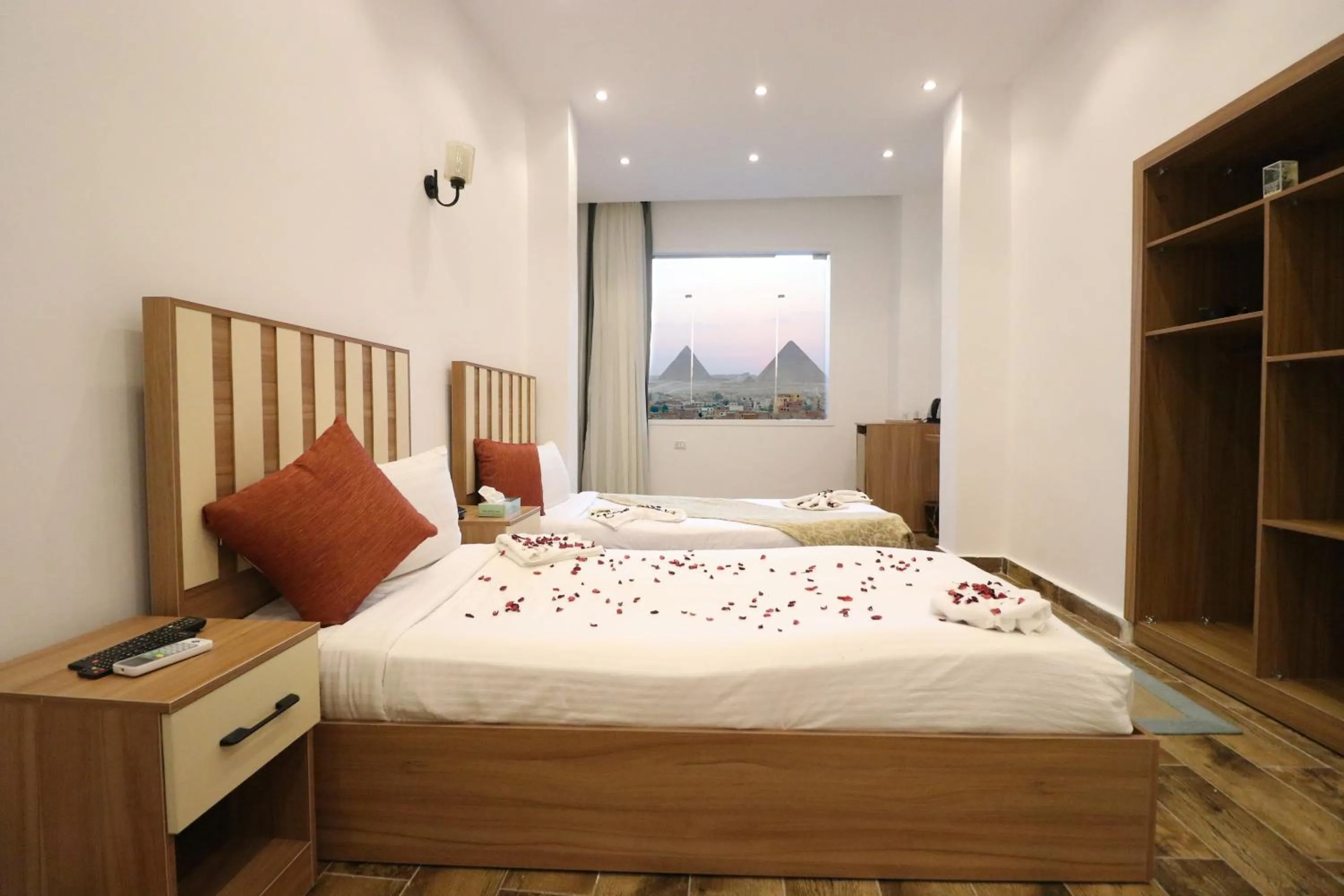 Bed in West Pyramids Hotel