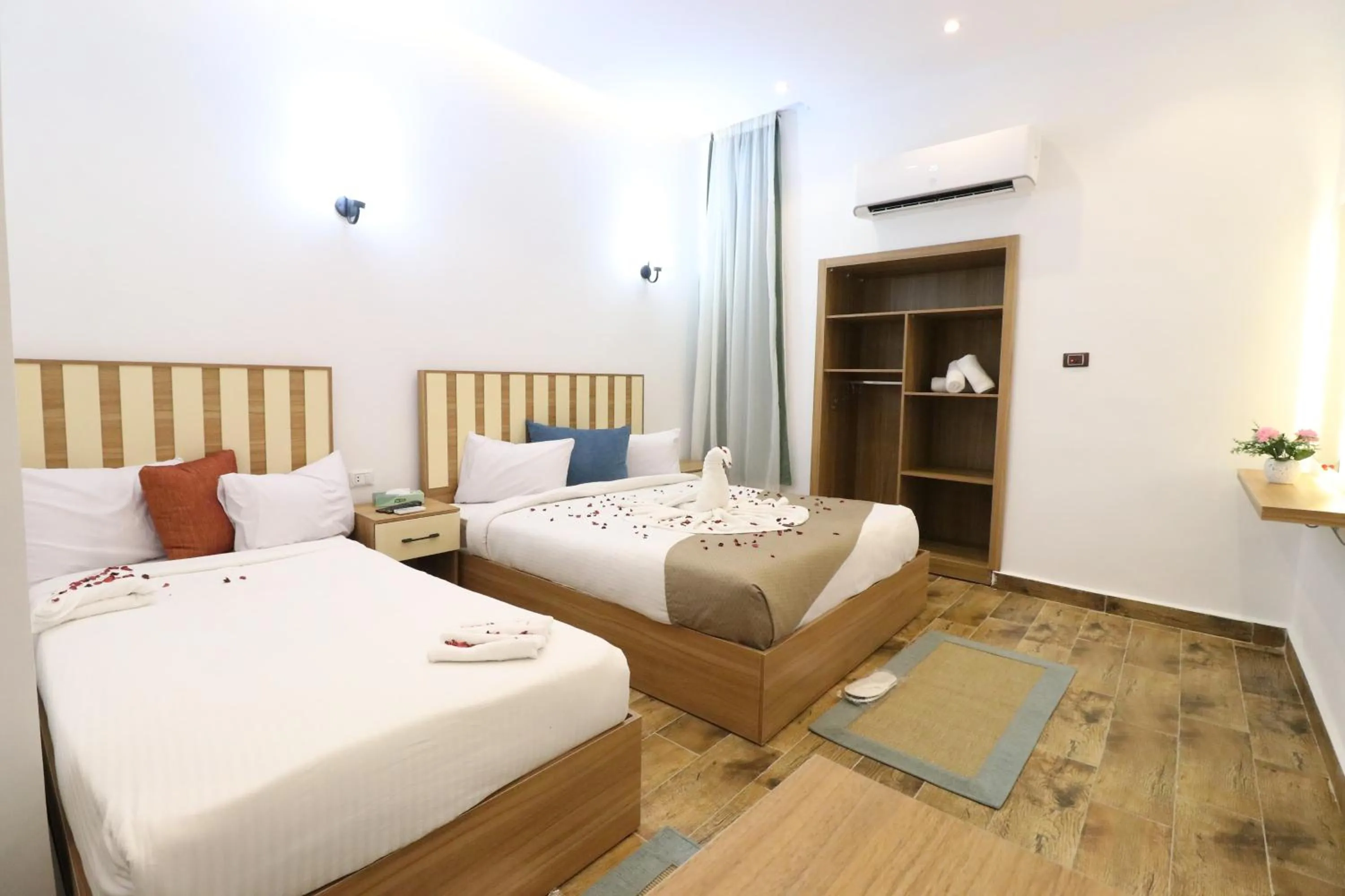 Bed in West Pyramids Hotel