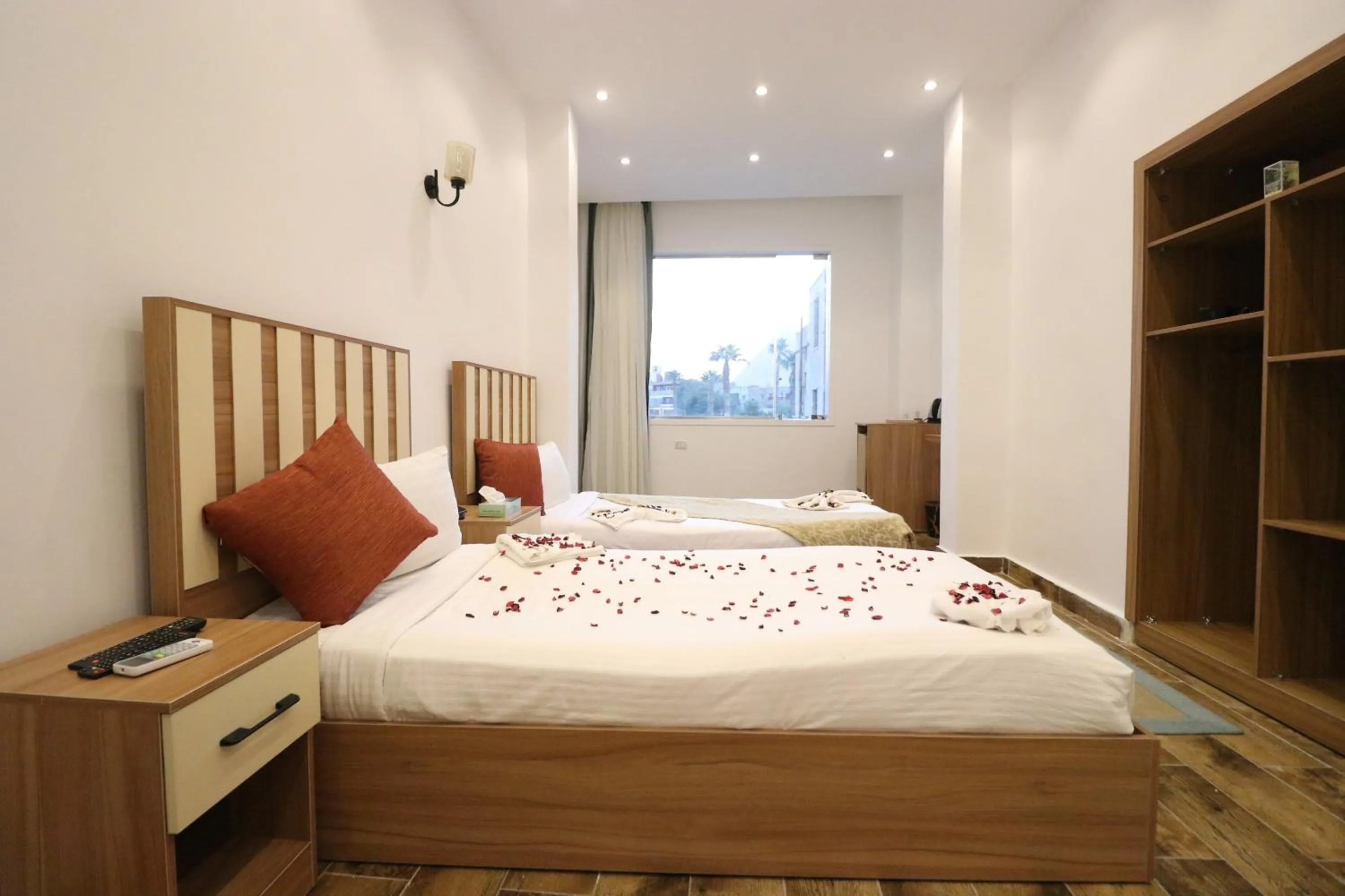 Bed in West Pyramids Hotel