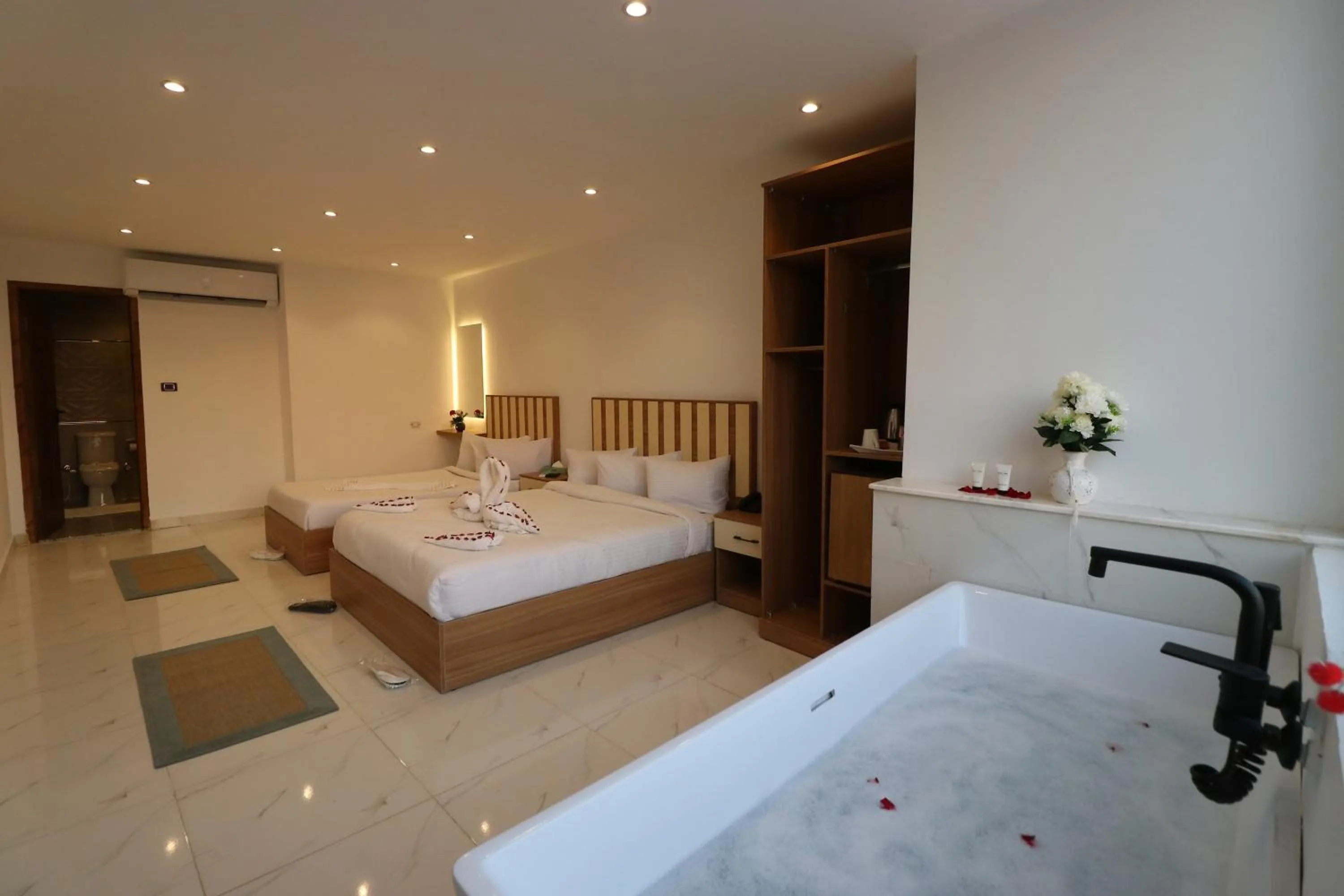 Bed in West Pyramids Hotel