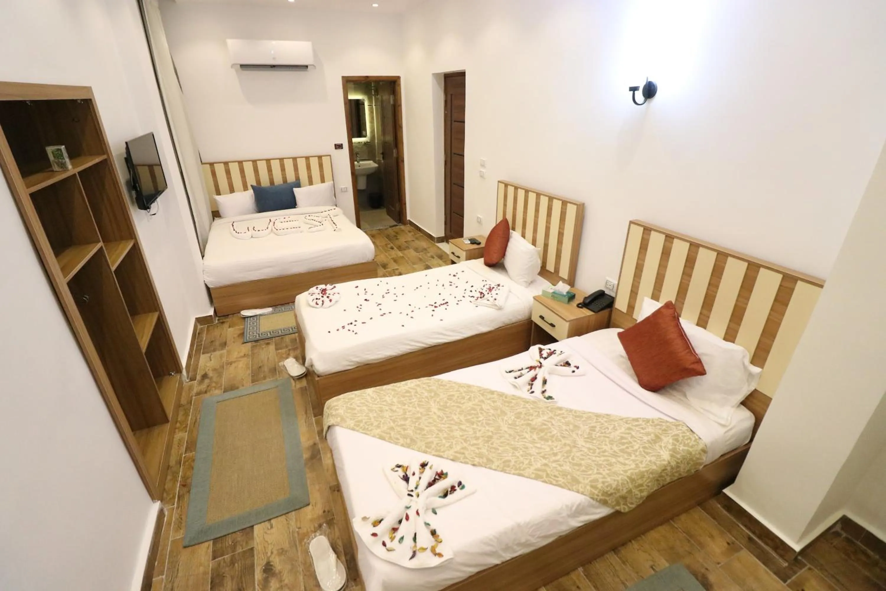 Bed in West Pyramids Hotel