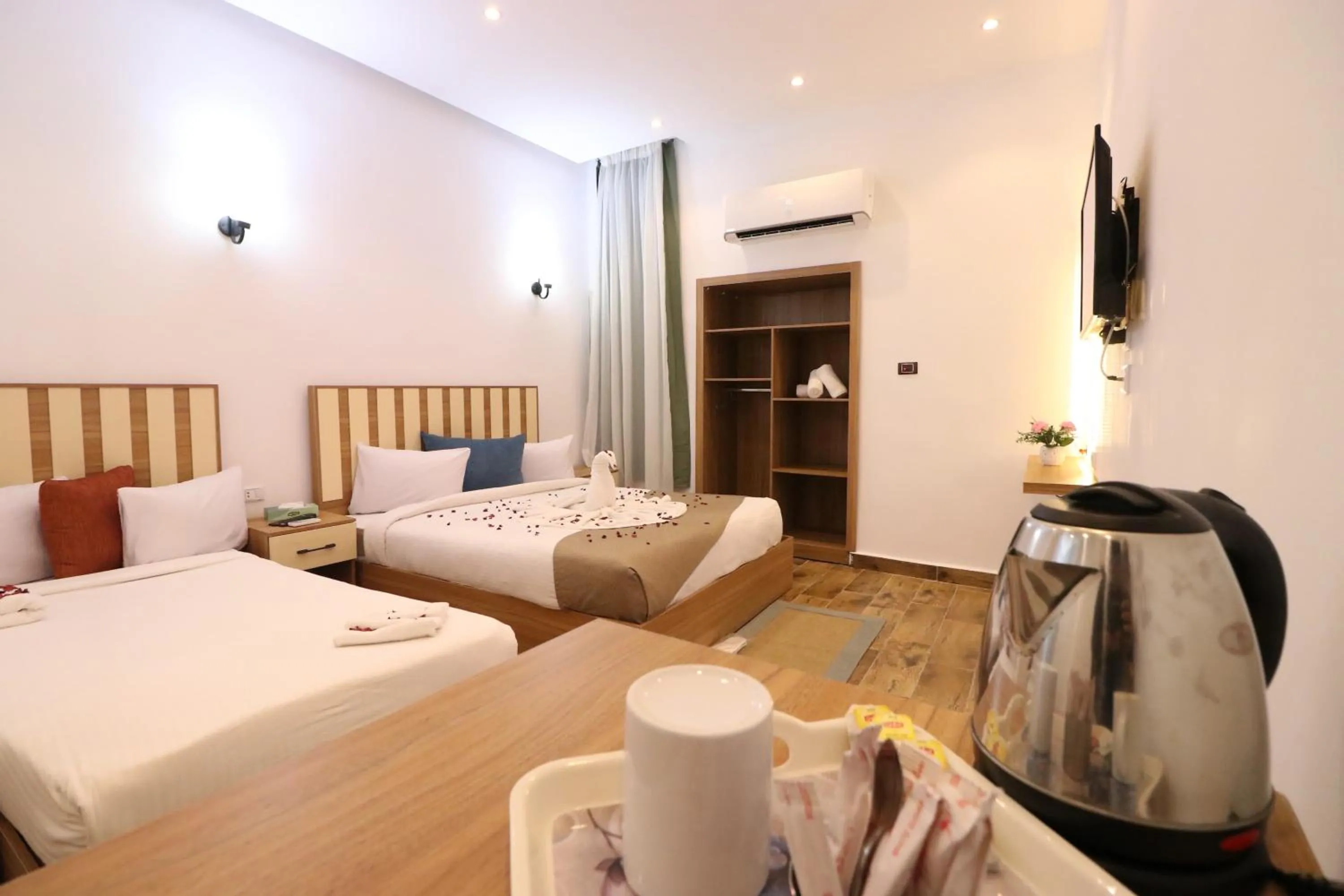 Bed in West Pyramids Hotel