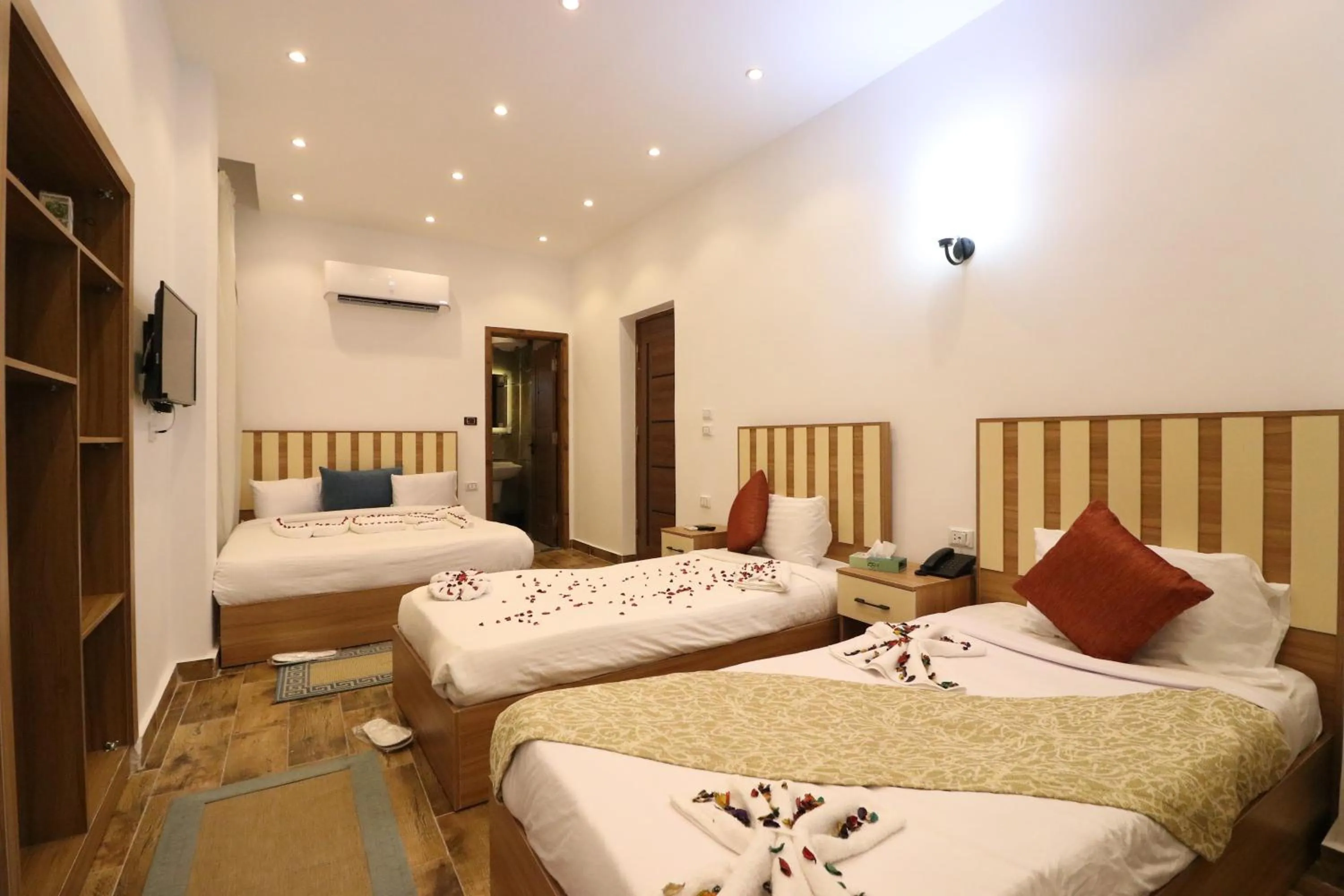 Bed in West Pyramids Hotel