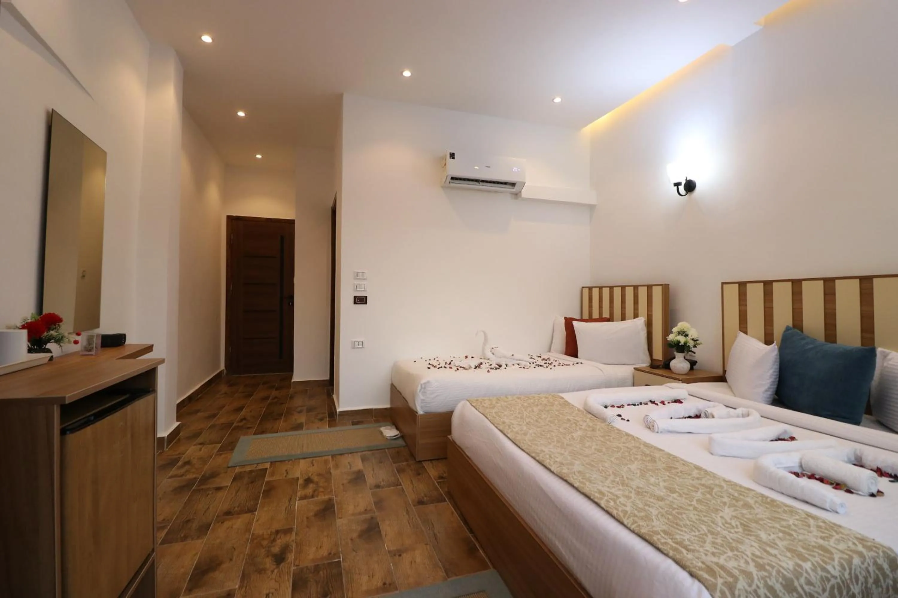 Bed in West Pyramids Hotel