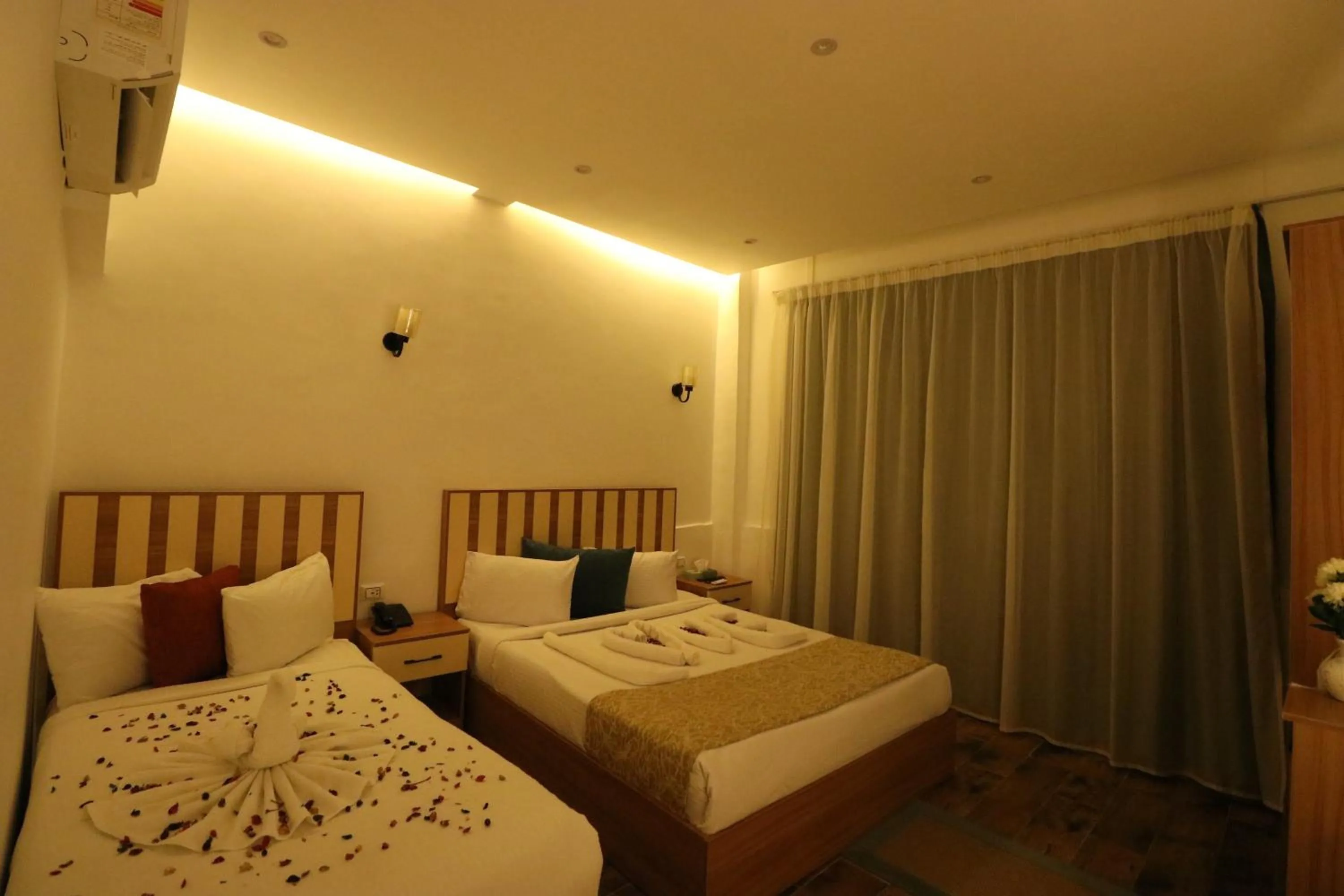 Bed in West Pyramids Hotel