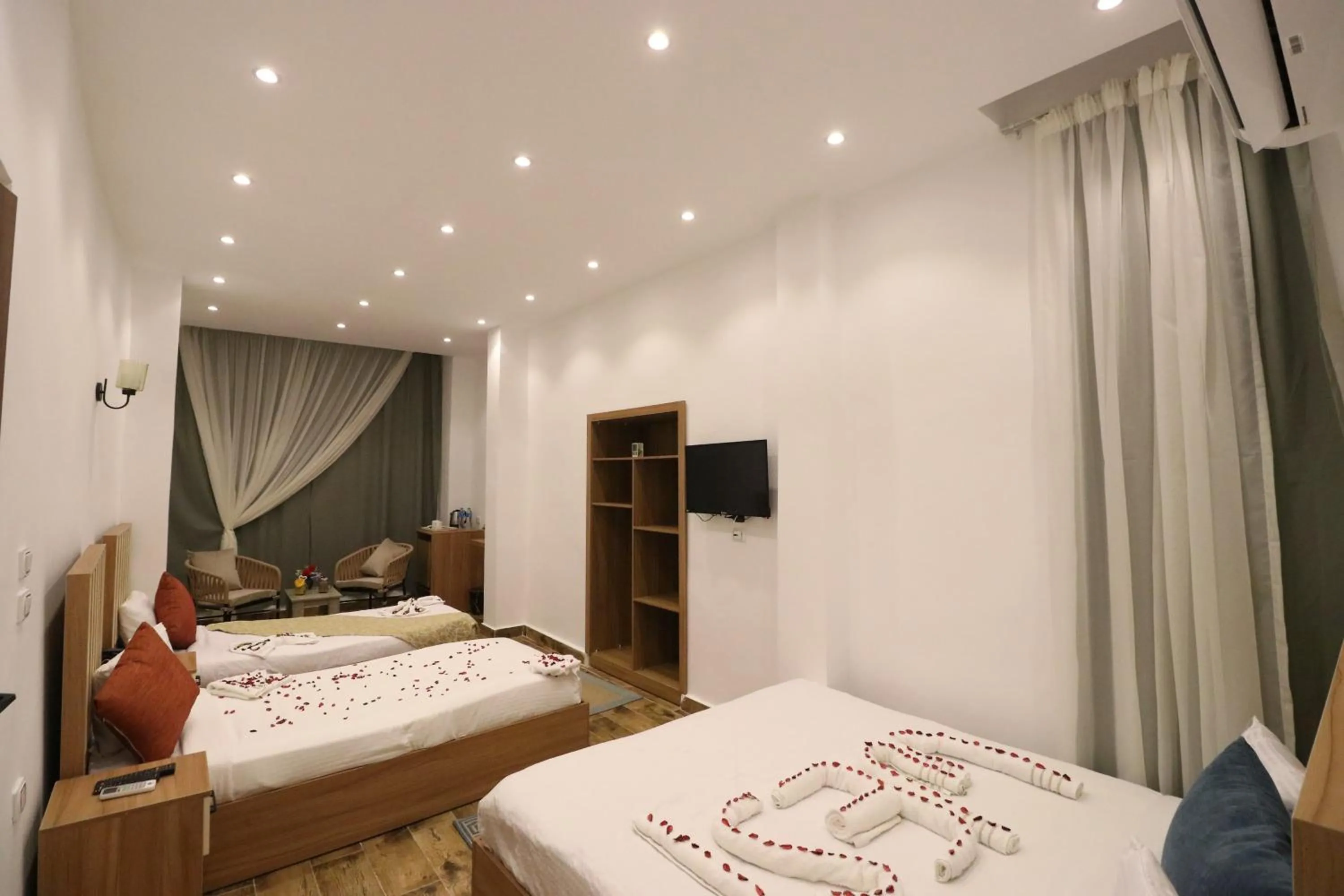Bed in West Pyramids Hotel
