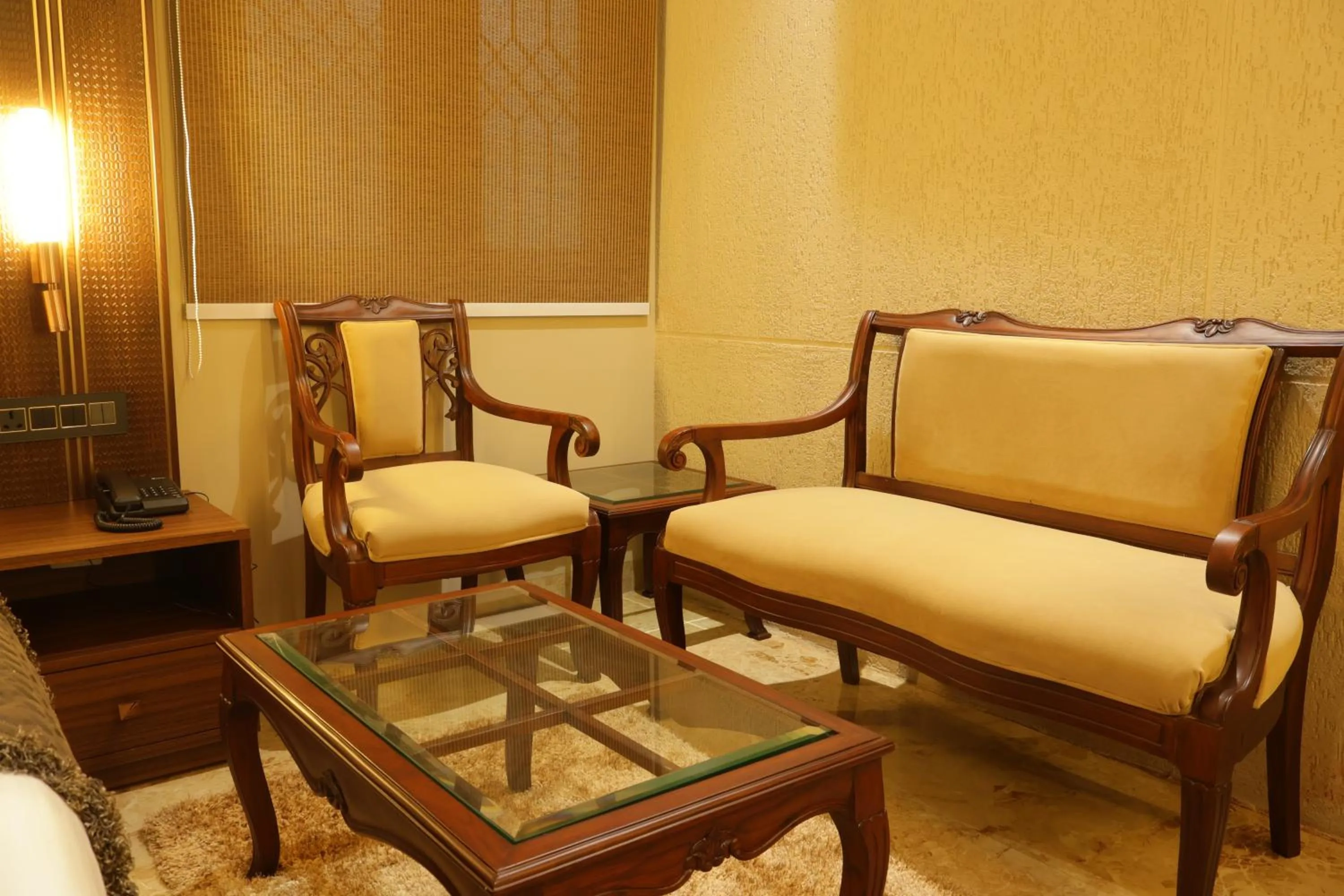 Seating area in Suramya Homestay Near Shymala Hills