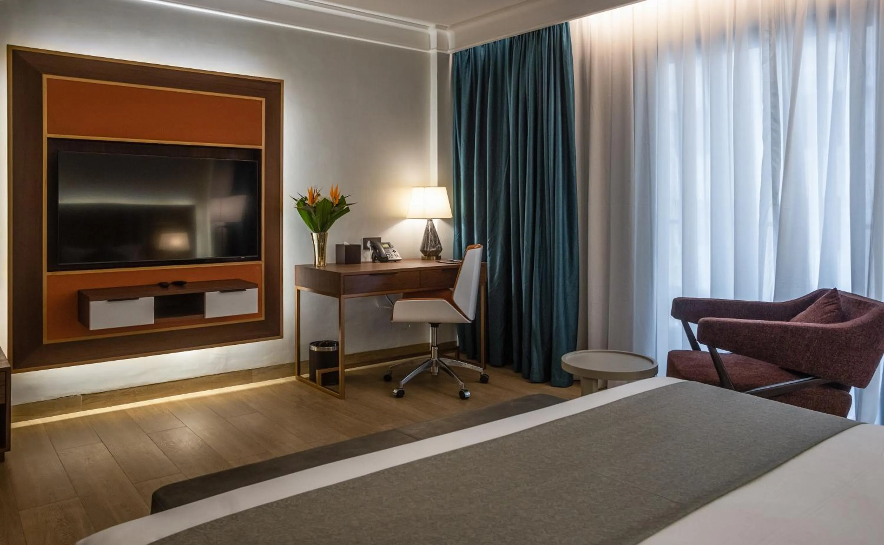 Bed in Okash City Boutique Hotel