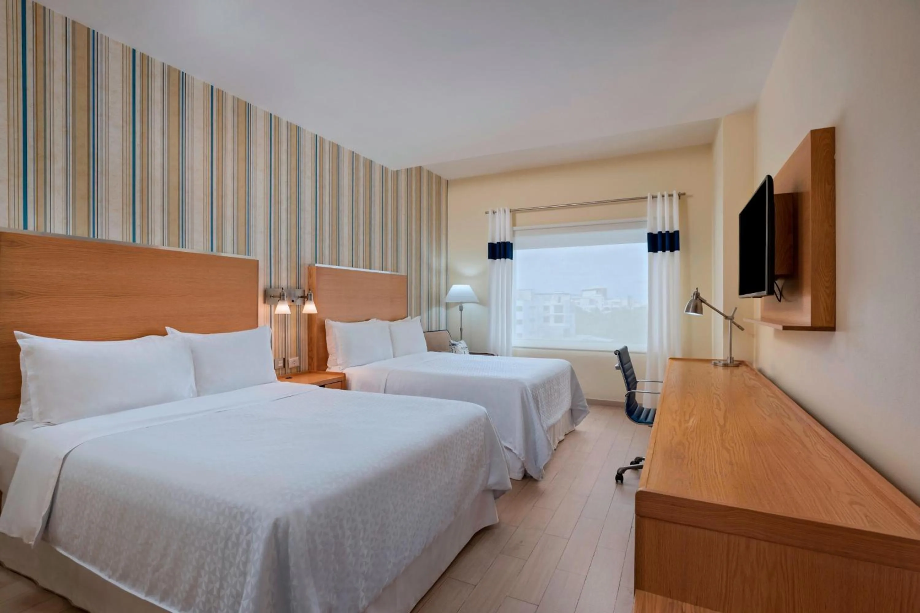 Photo of the whole room, Bed in Four Points by Sheraton Cancun Centro