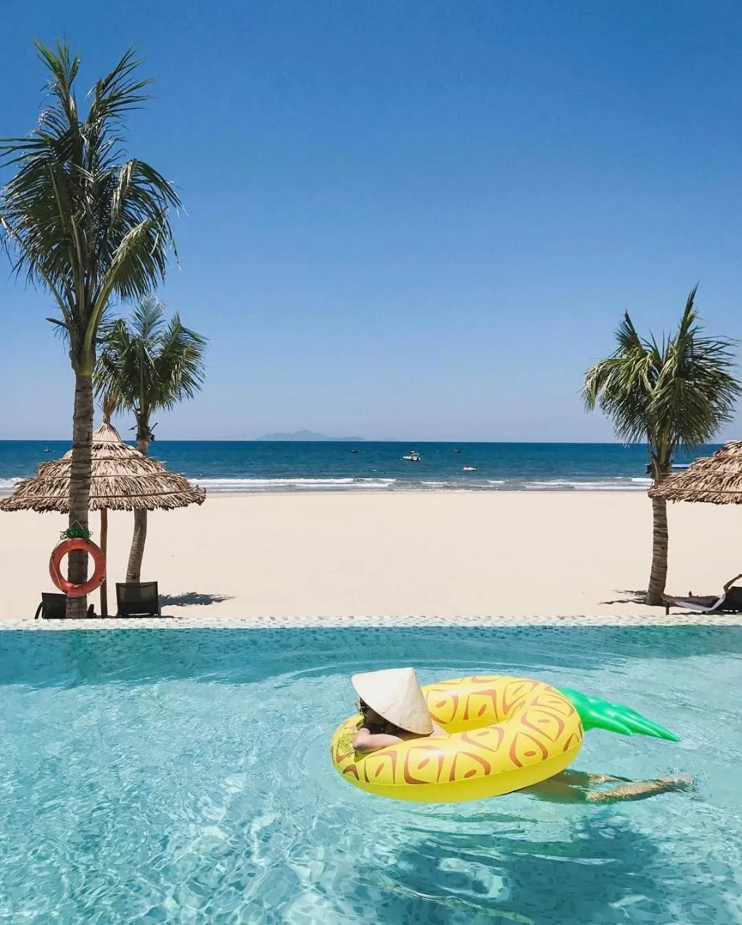 Swimming pool in Fusion Suites Da Nang