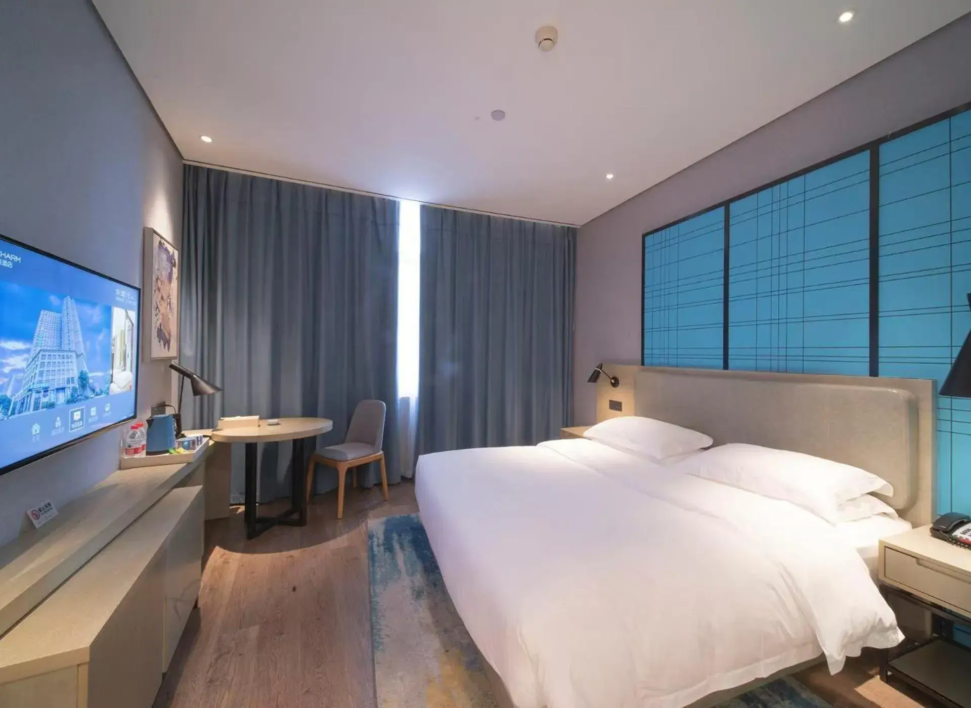 Bed in Echarm Hotel Wuhan Caidian Street Linzhang Avenue Metro Station Bed in Echarm Hotel Wuhan Caidian Street Linzhang Avenue Metro Station