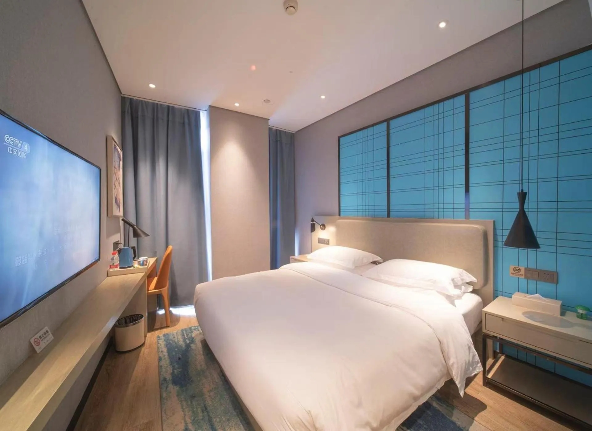 Bed in Echarm Hotel Wuhan Caidian Street Linzhang Avenue Metro Station